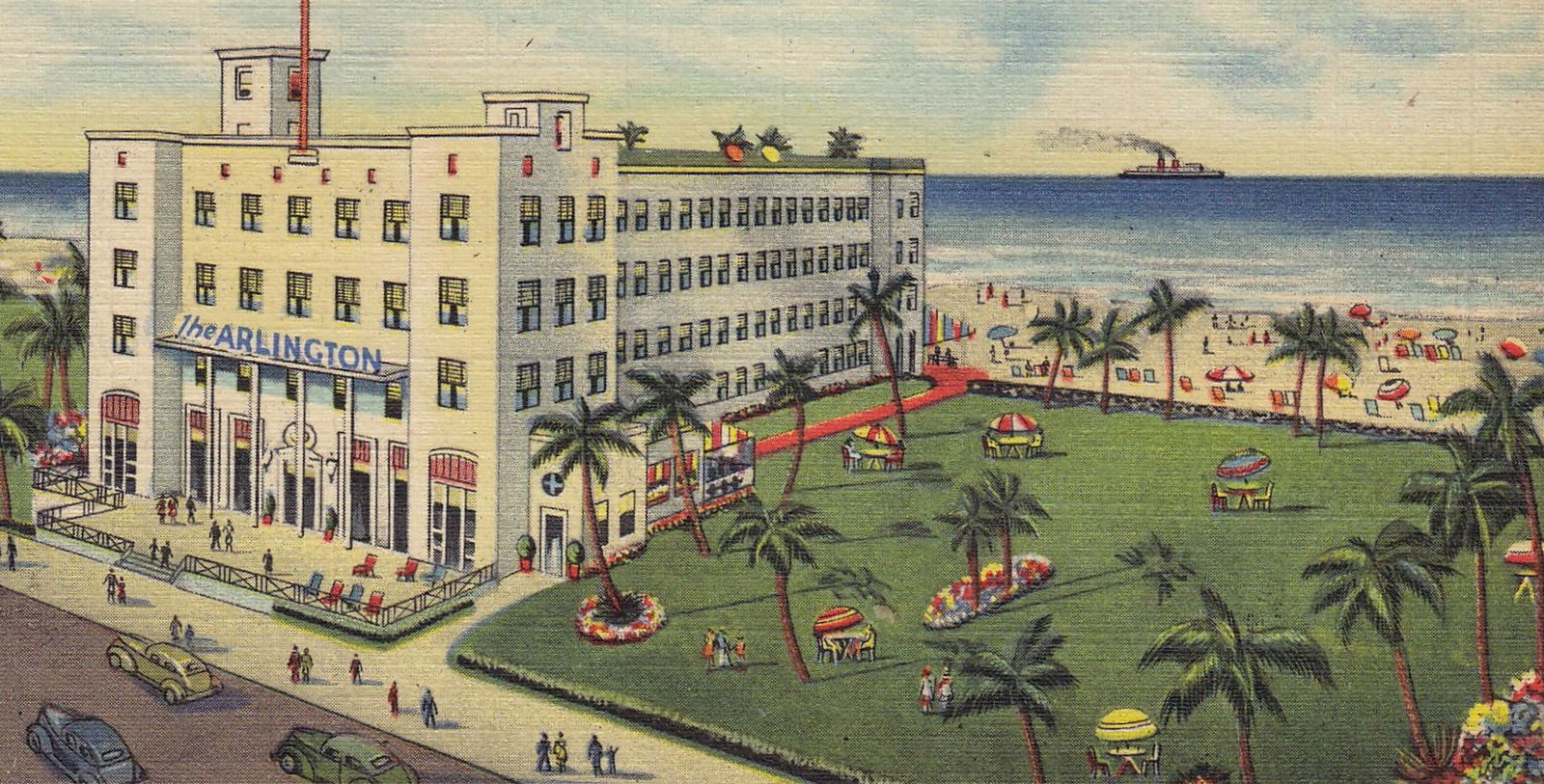 a large building with palm trees and people on the beach
