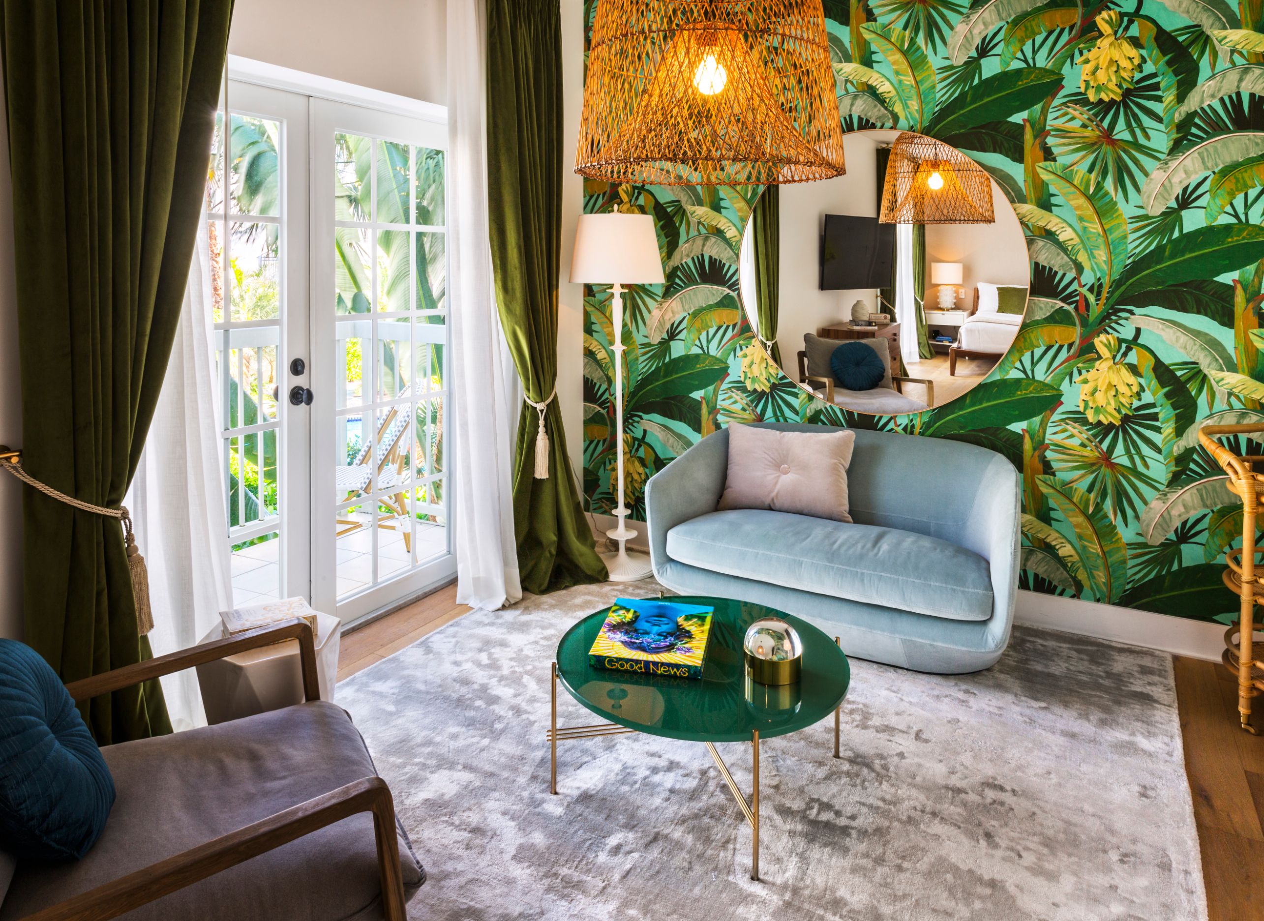 a room with a mirror and a couch