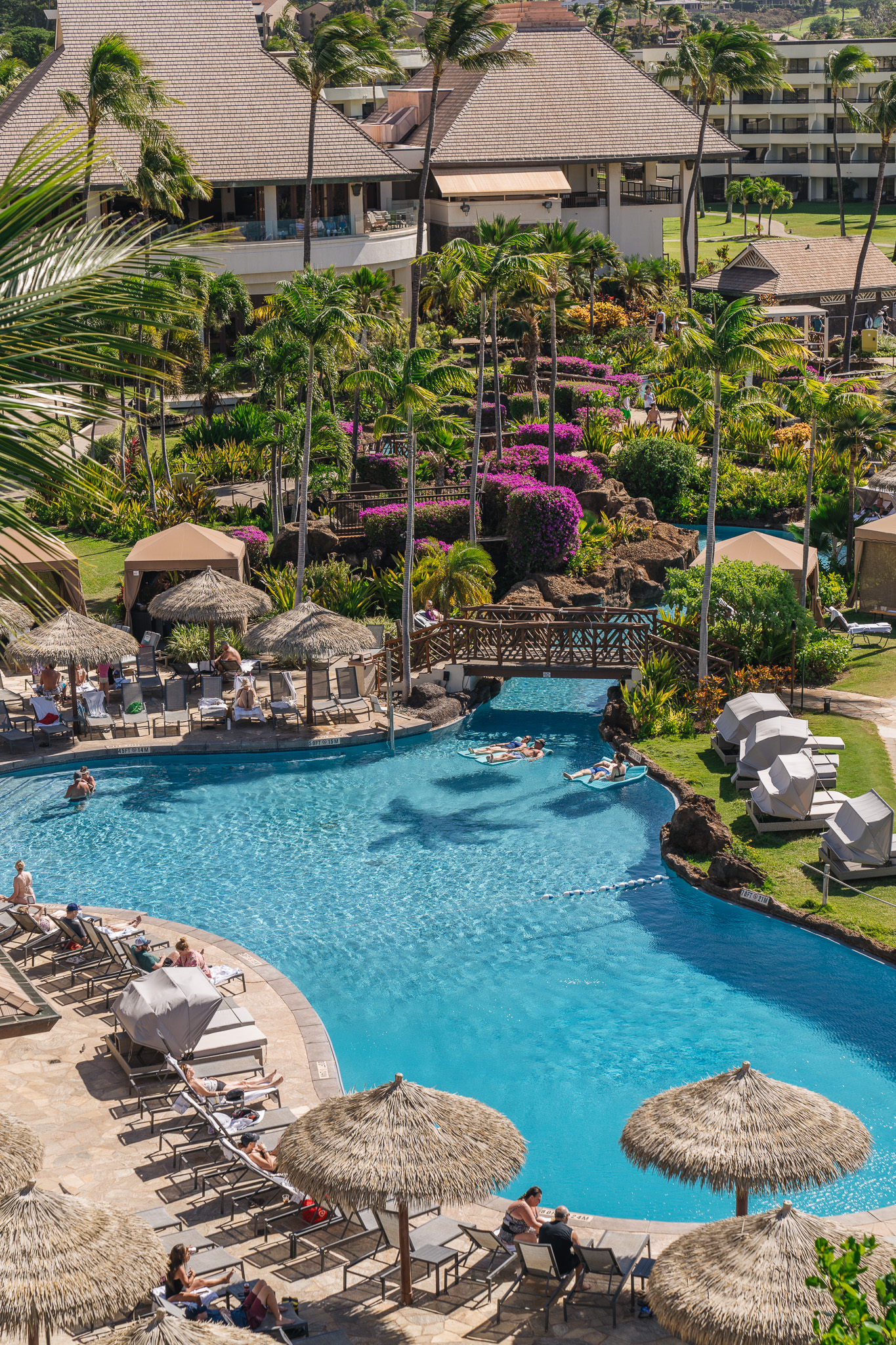 a swimming pool with people in it