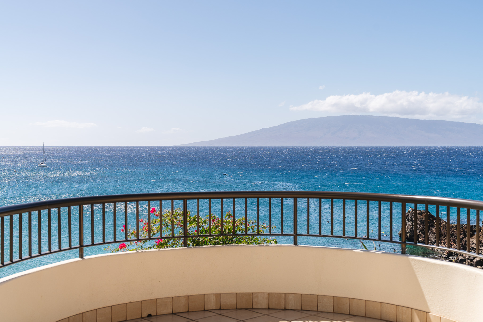 a balcony overlooking the ocean