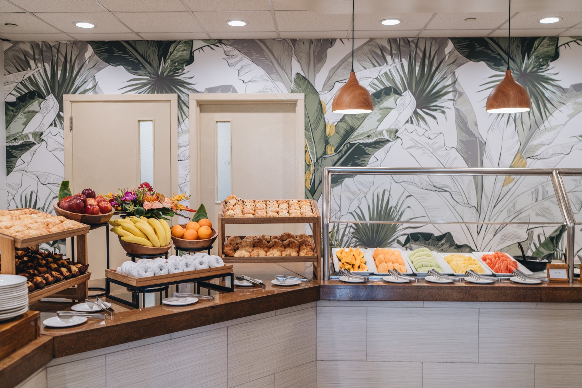 a buffet with fruit on the counter