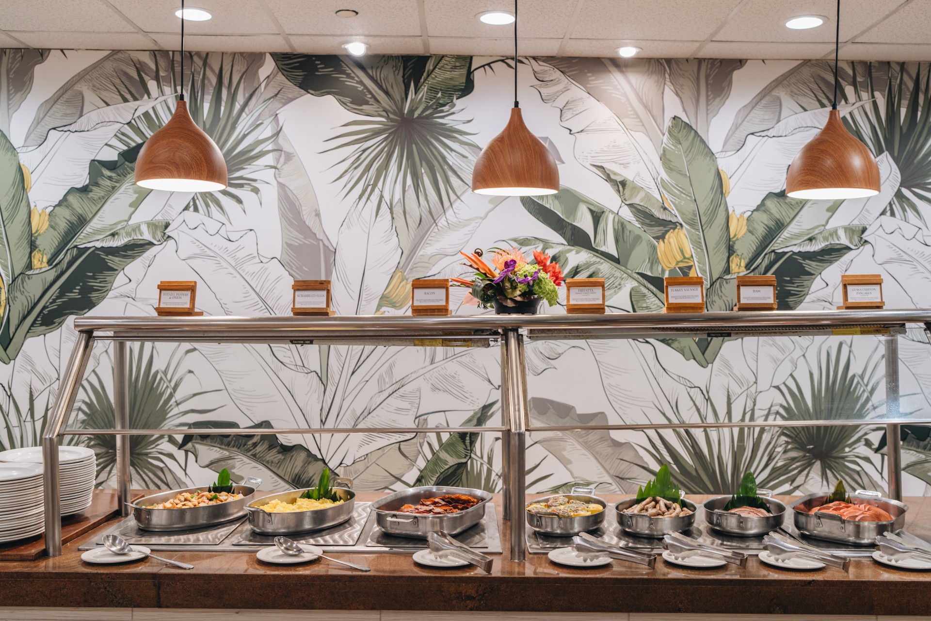 a buffet line with food on it