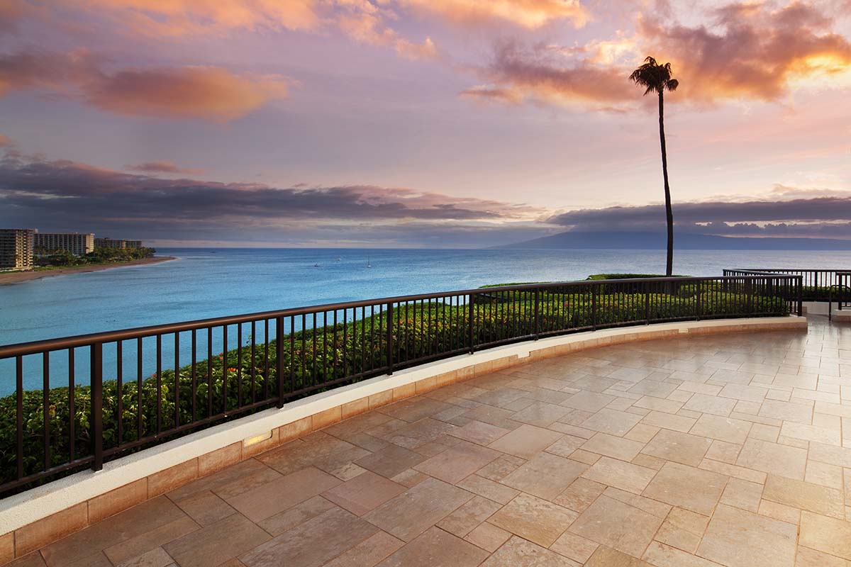 a balcony overlooking a body of water