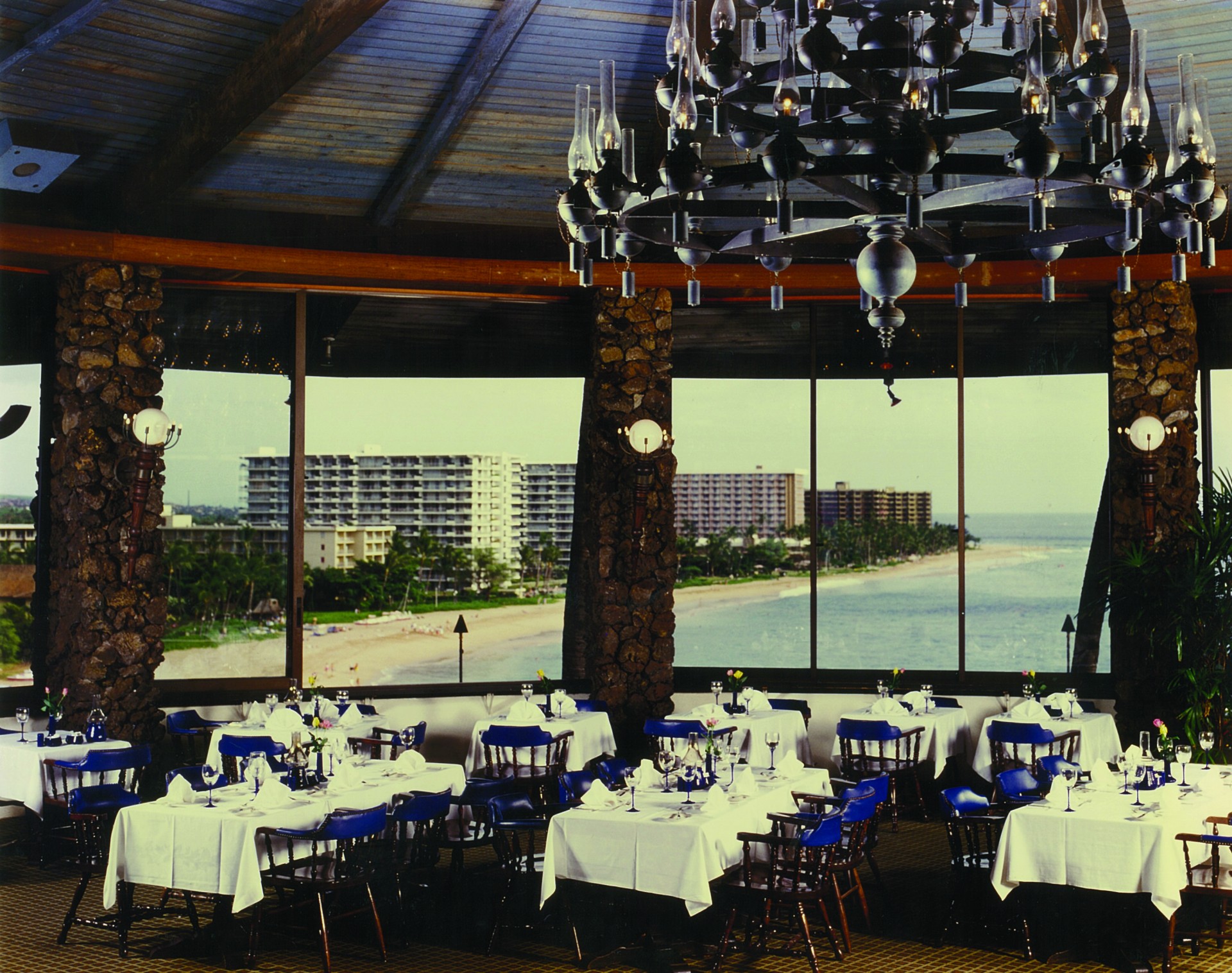 a restaurant with tables and chairs