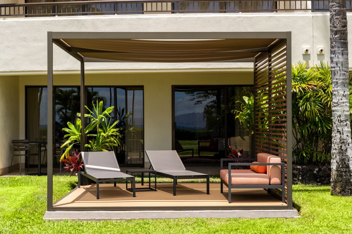a deck with chairs on a patio