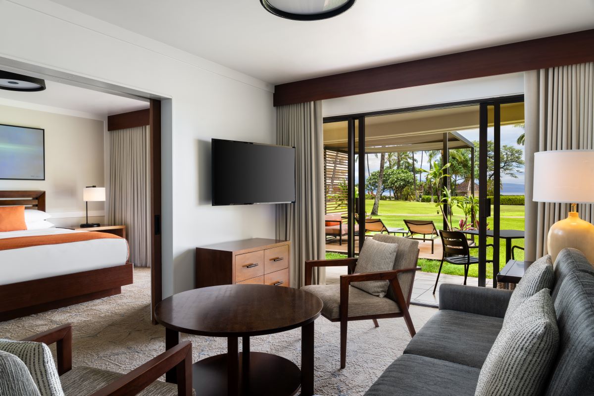 a room with a television and a bed