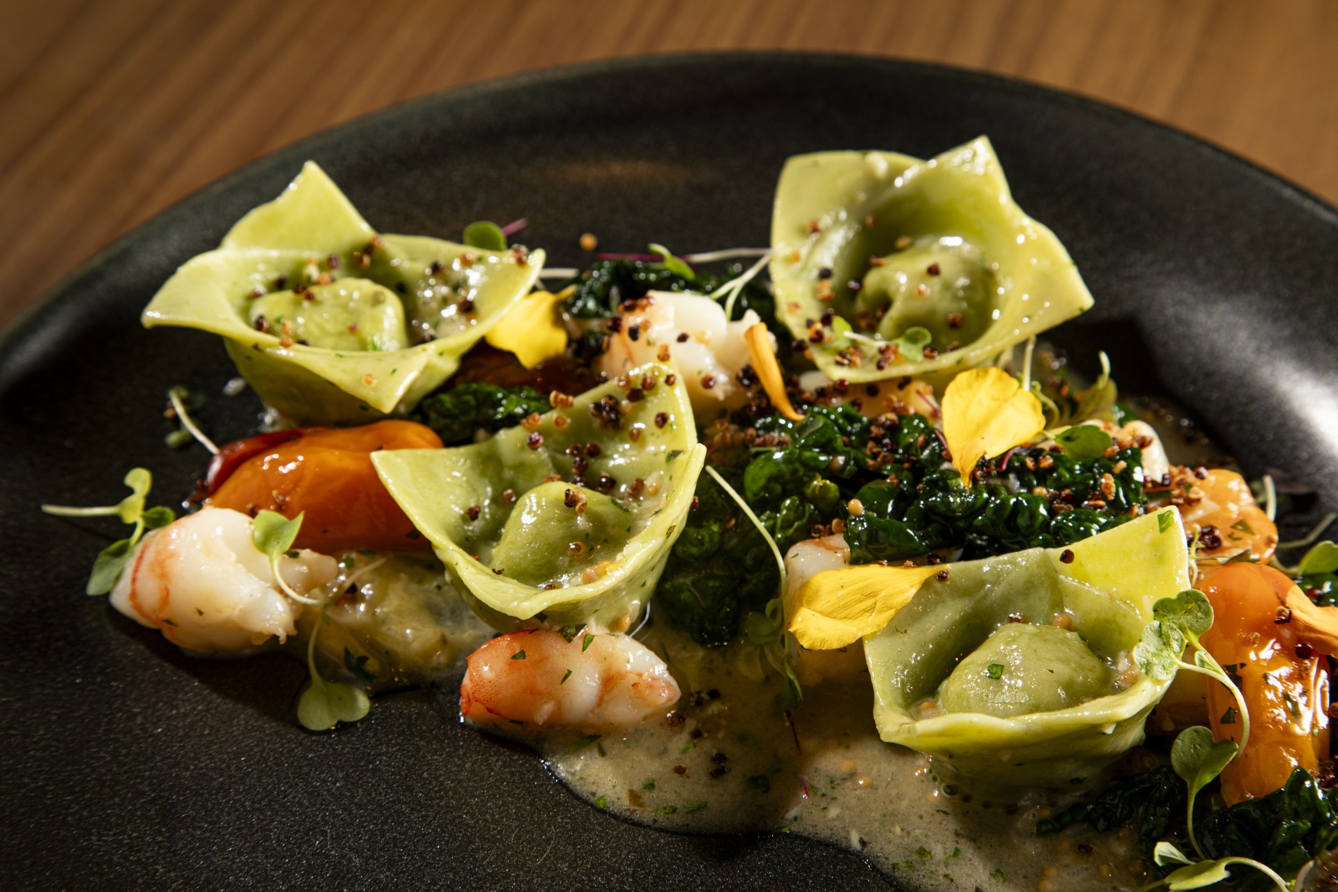 a plate of food on a wood table