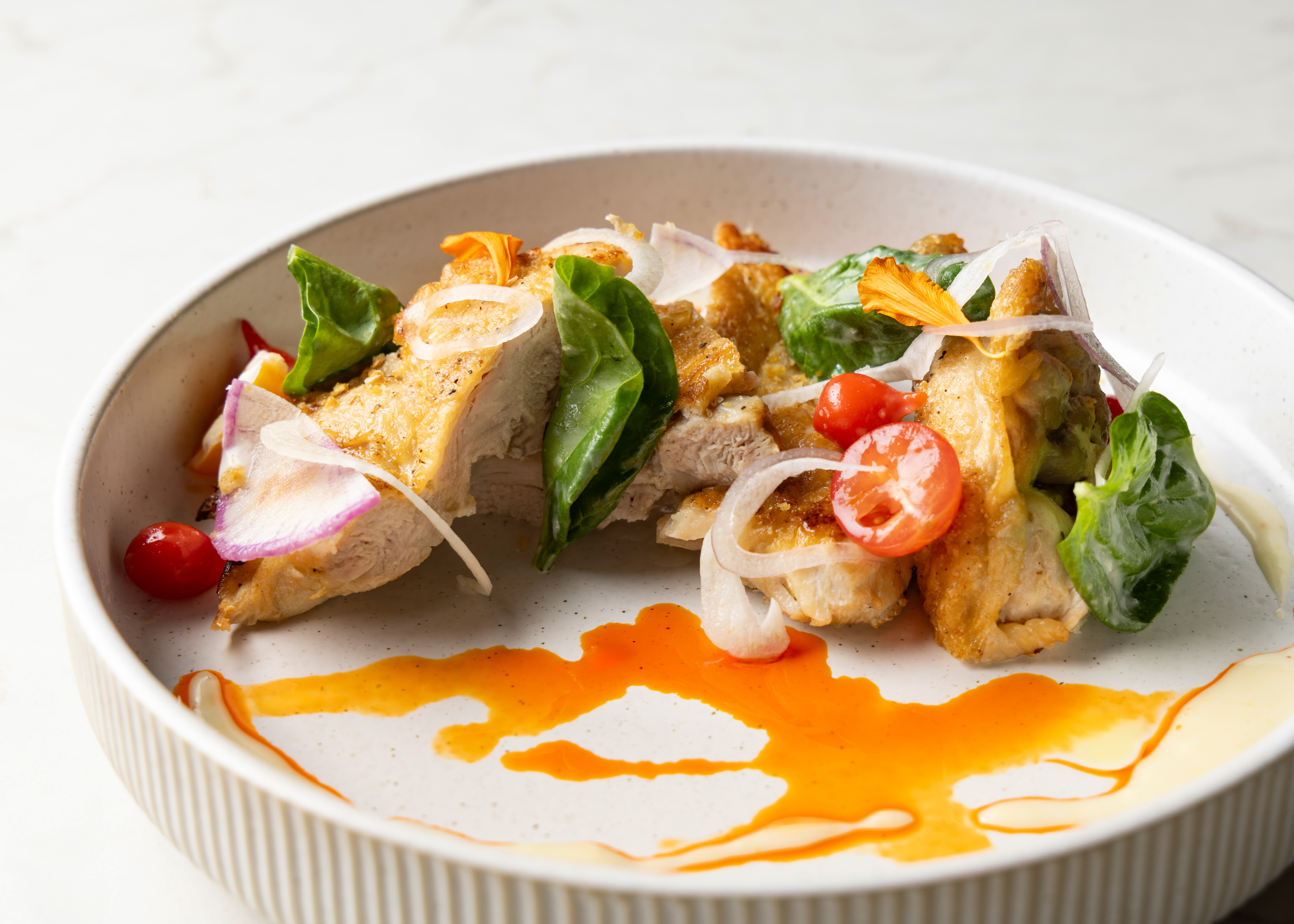 a plate of food with sauce on it