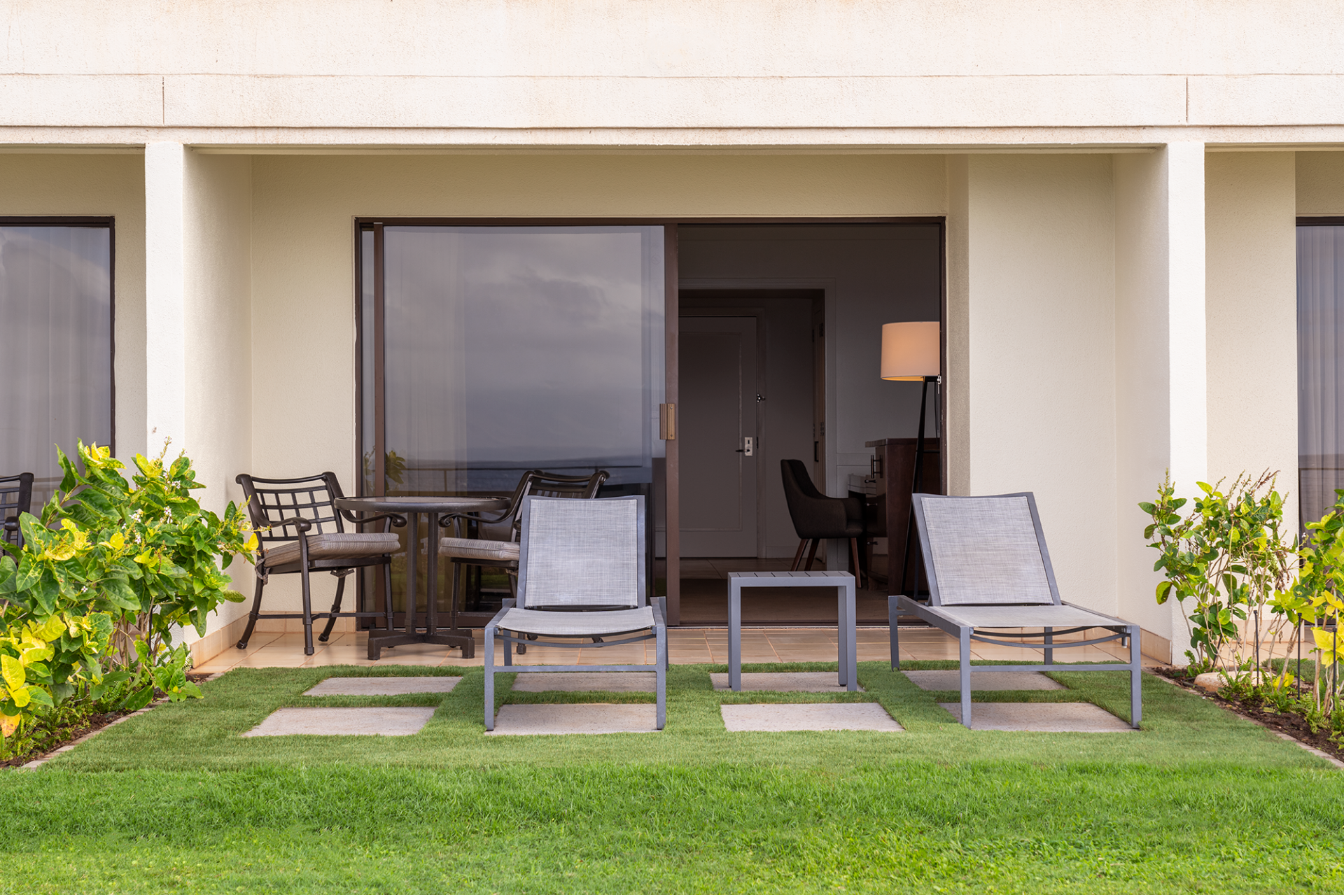 chairs and tables outside a building