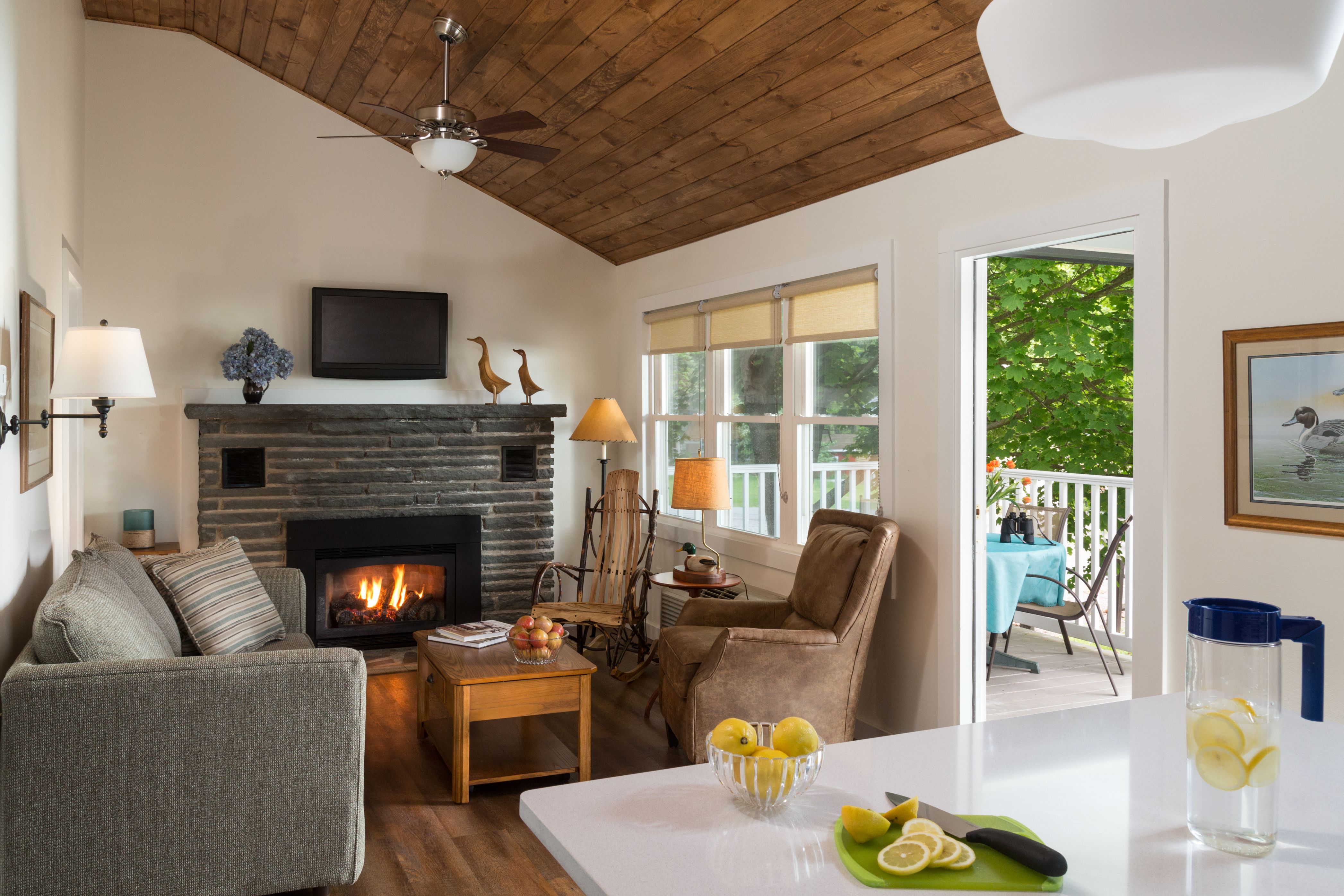 a living room with a fireplace and a couch