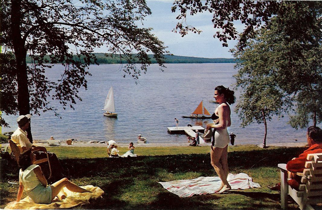 a group of people on a picnic blanket