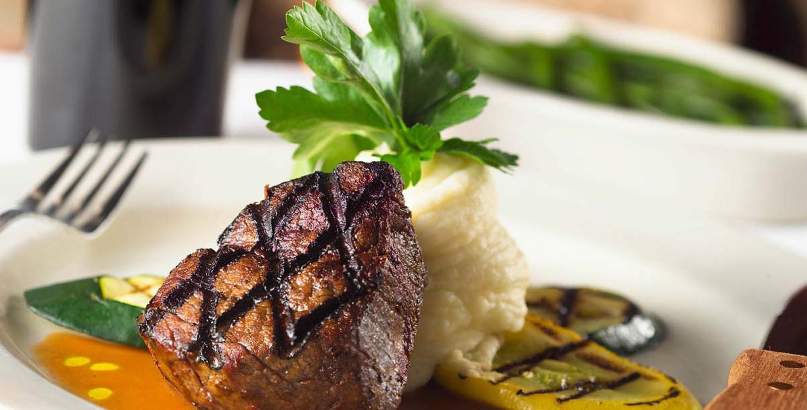 a plate of food with a garnish