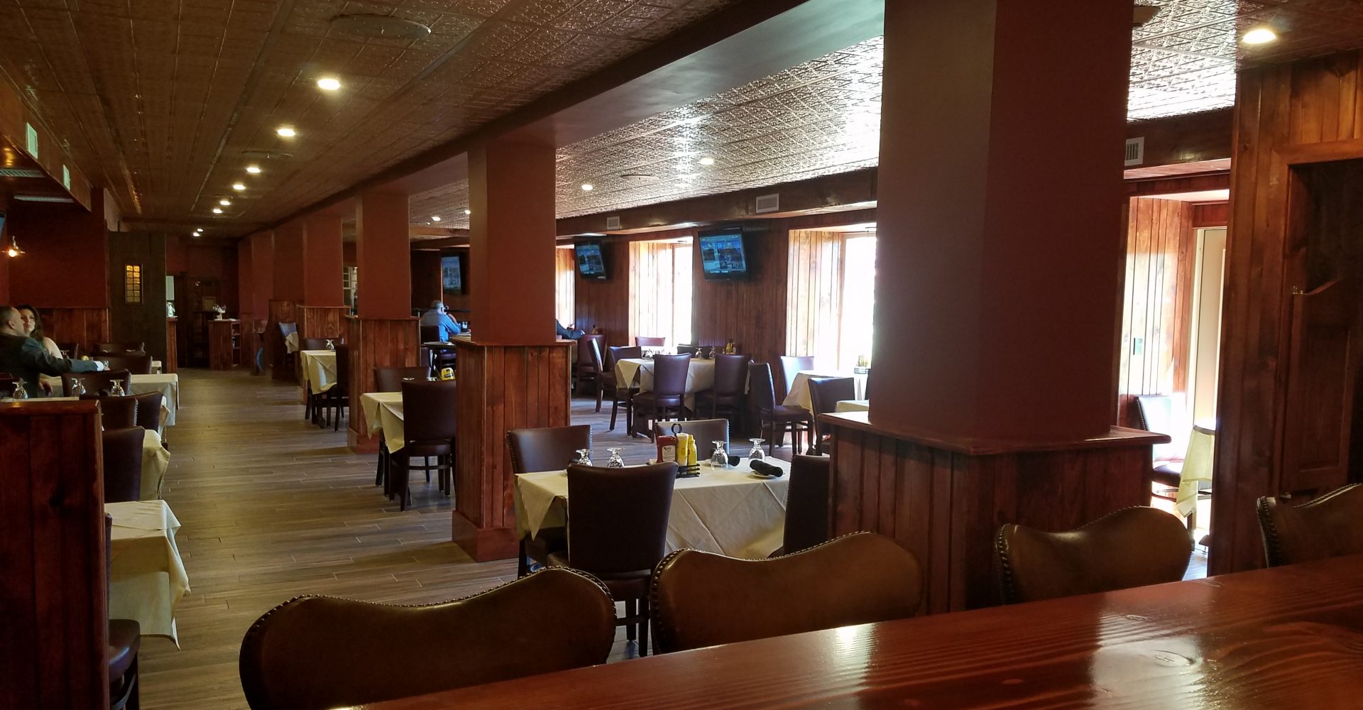 a room with tables and chairs