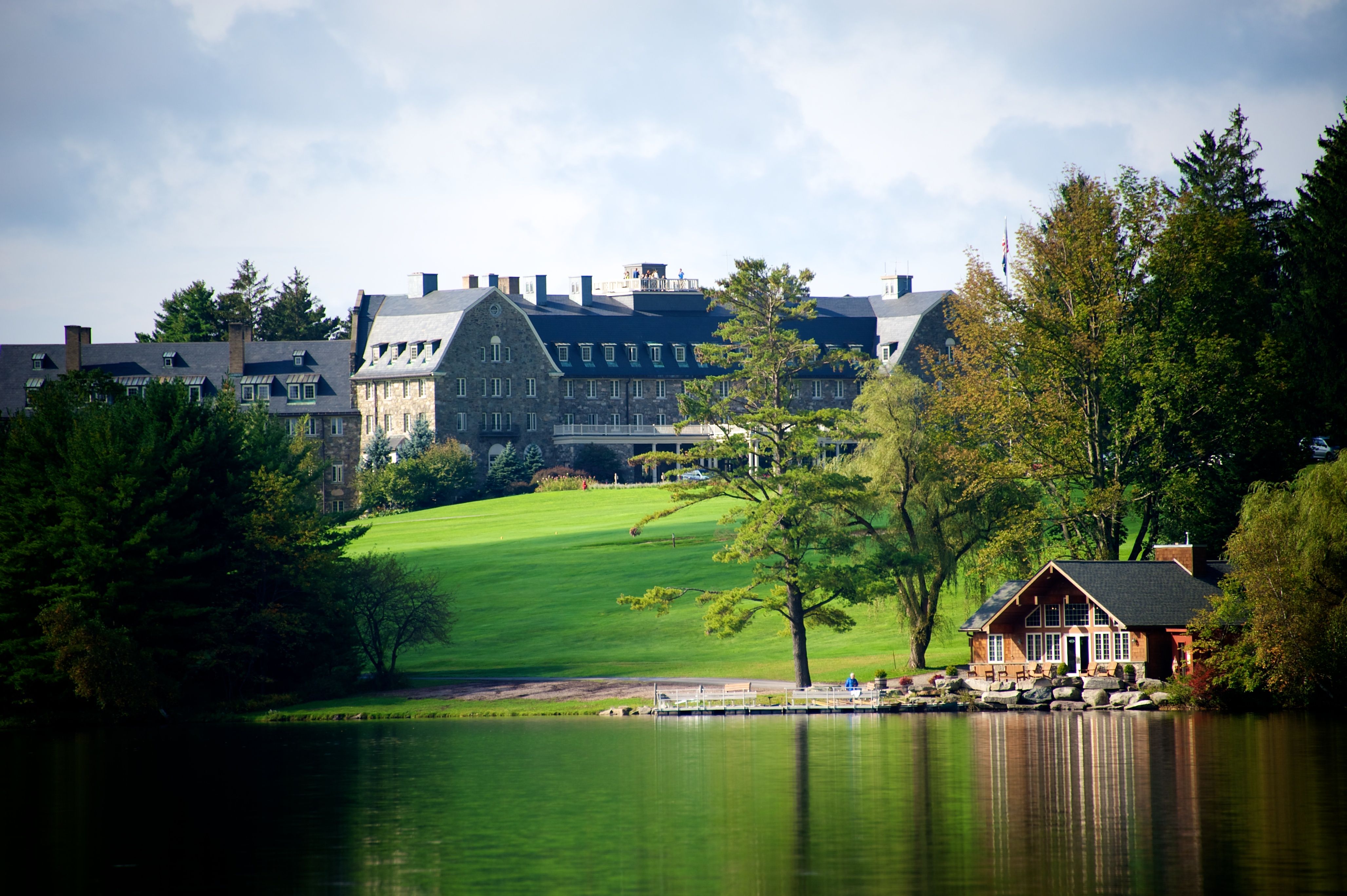 a large building next to a lake
