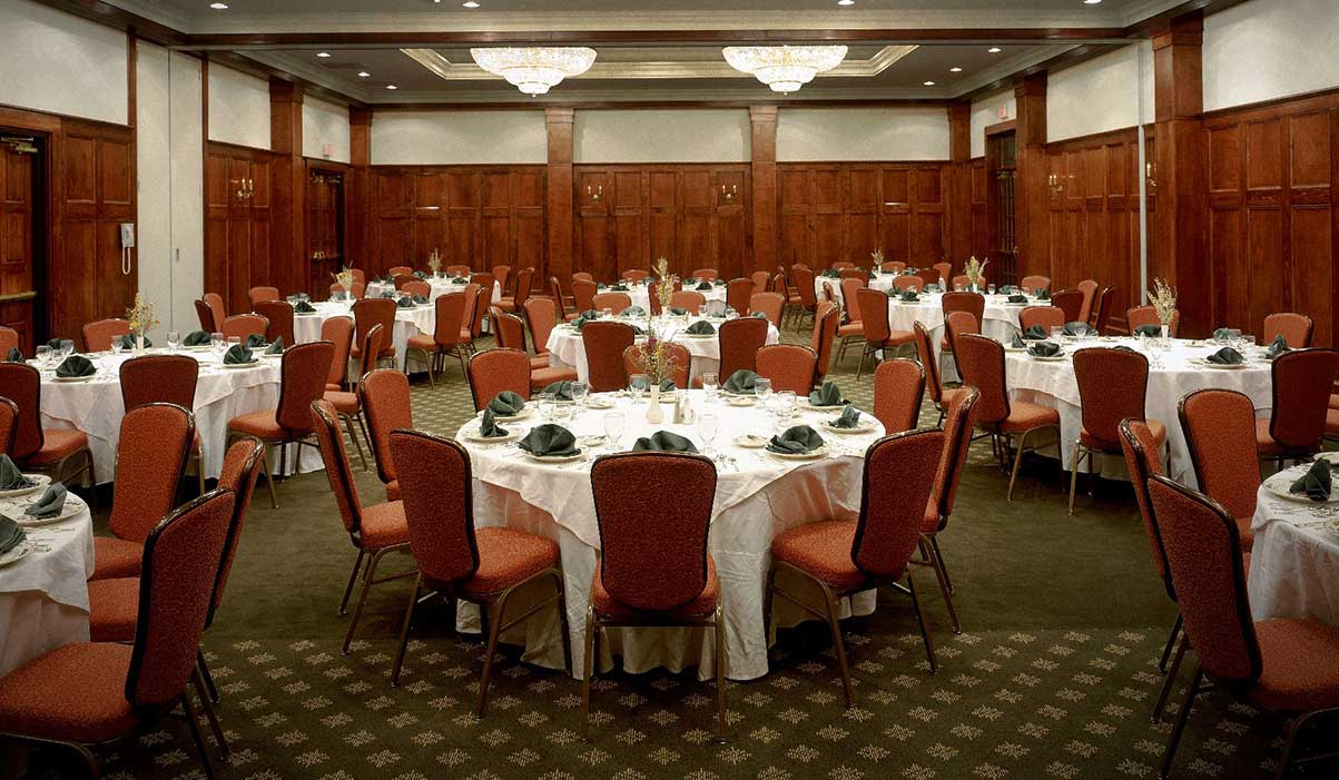 a room with tables and chairs