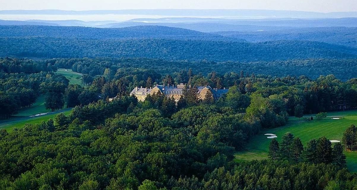 a large building surrounded by trees
