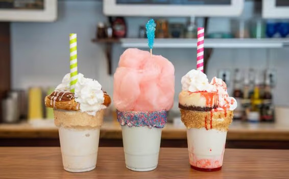 a group of ice cream sundaes
