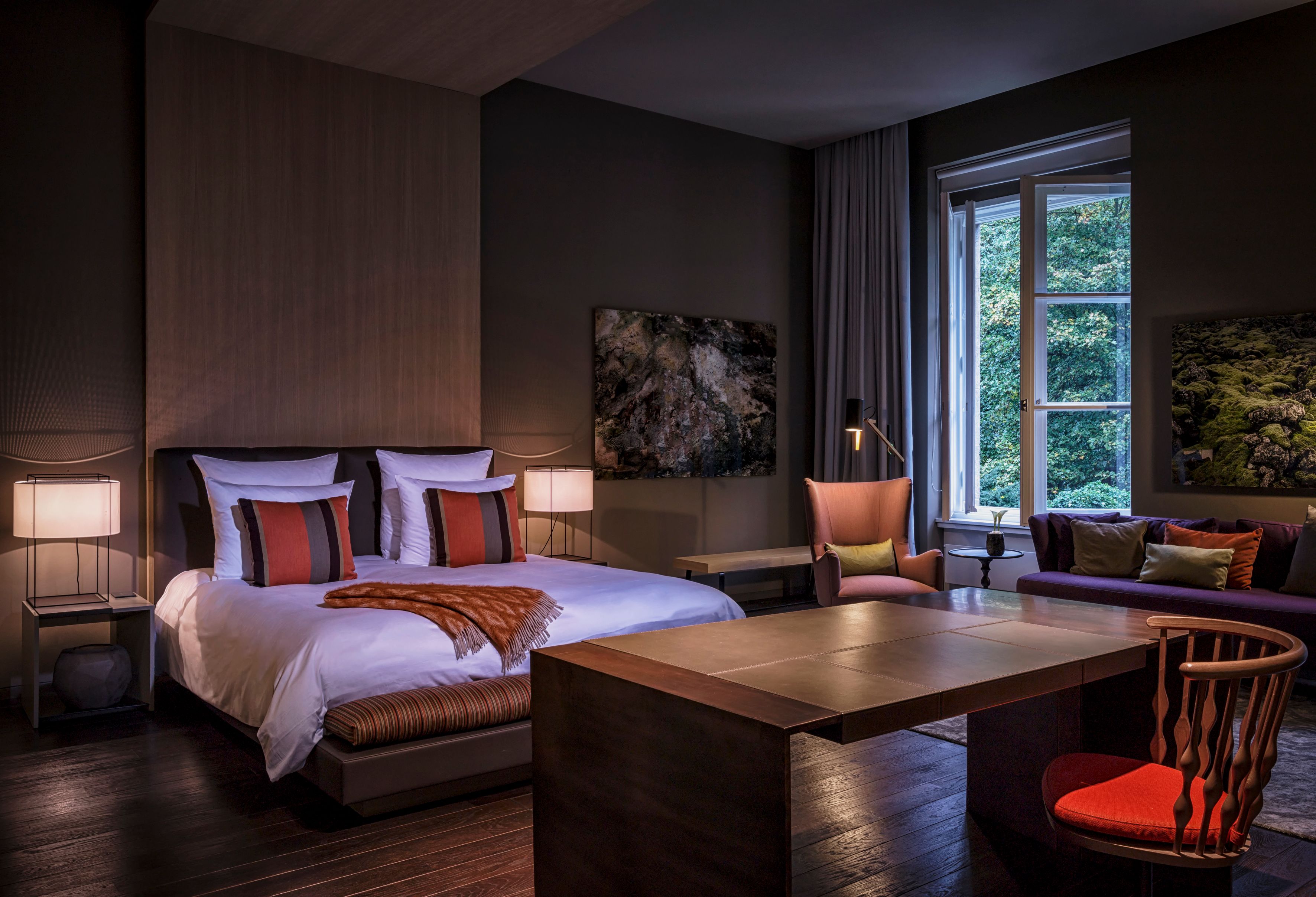 a room with a bed and a table