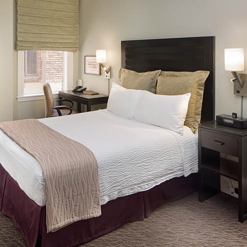 image of guestroom with queen bed sofia hotel san diego california_high