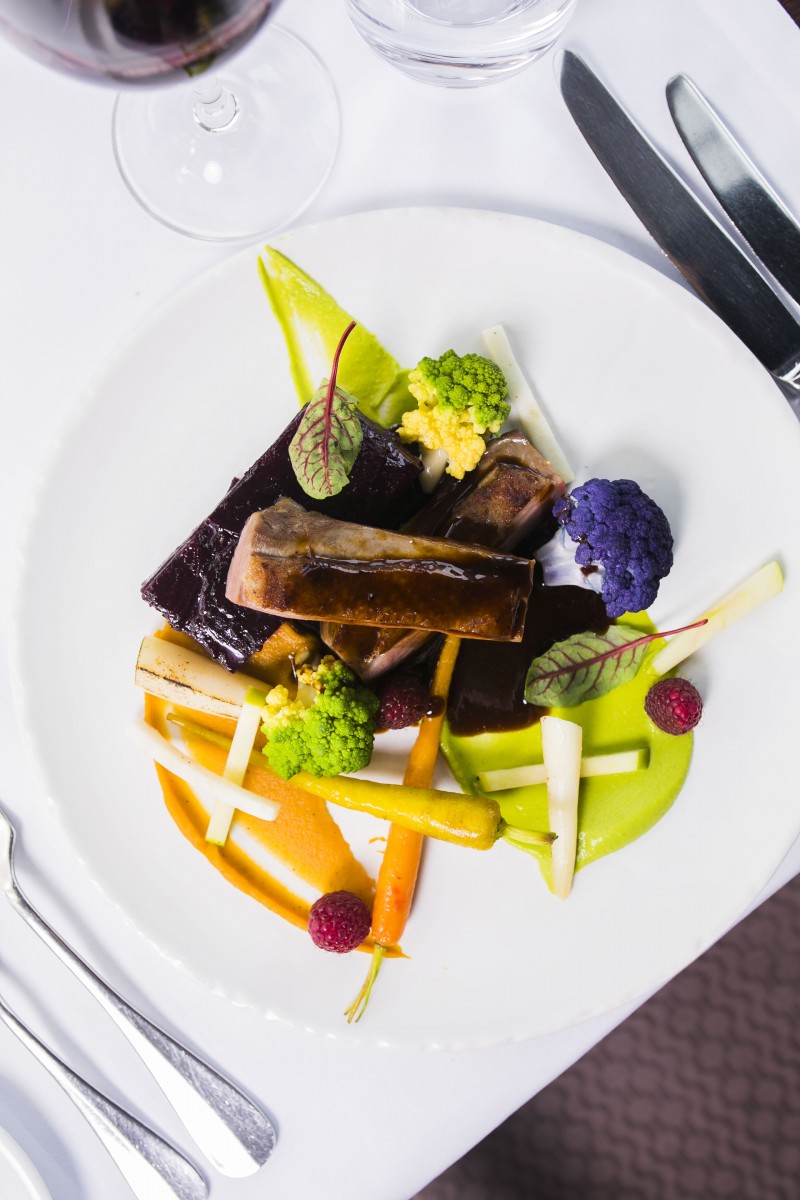 a plate of food on a white surface