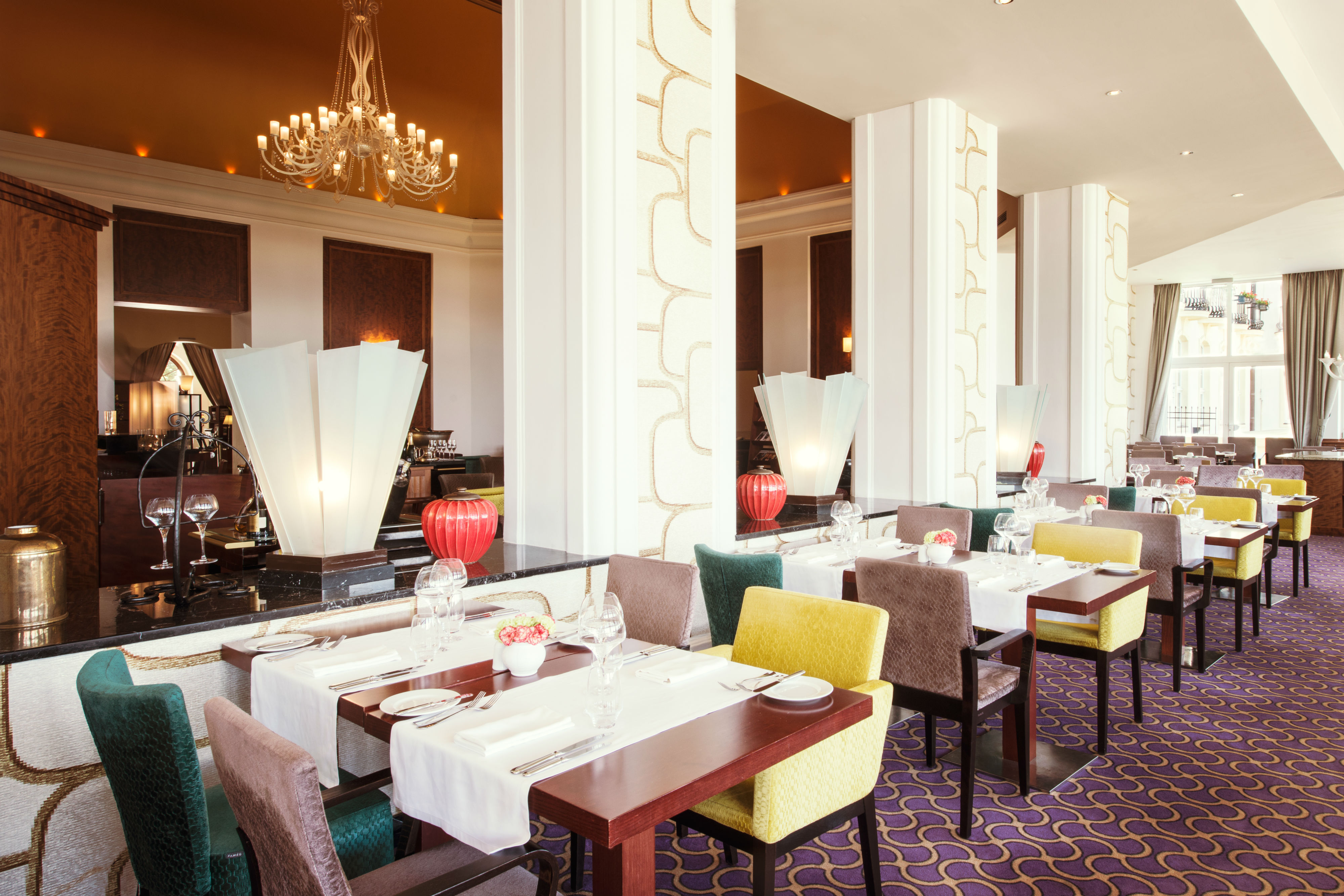 a restaurant with tables and chairs