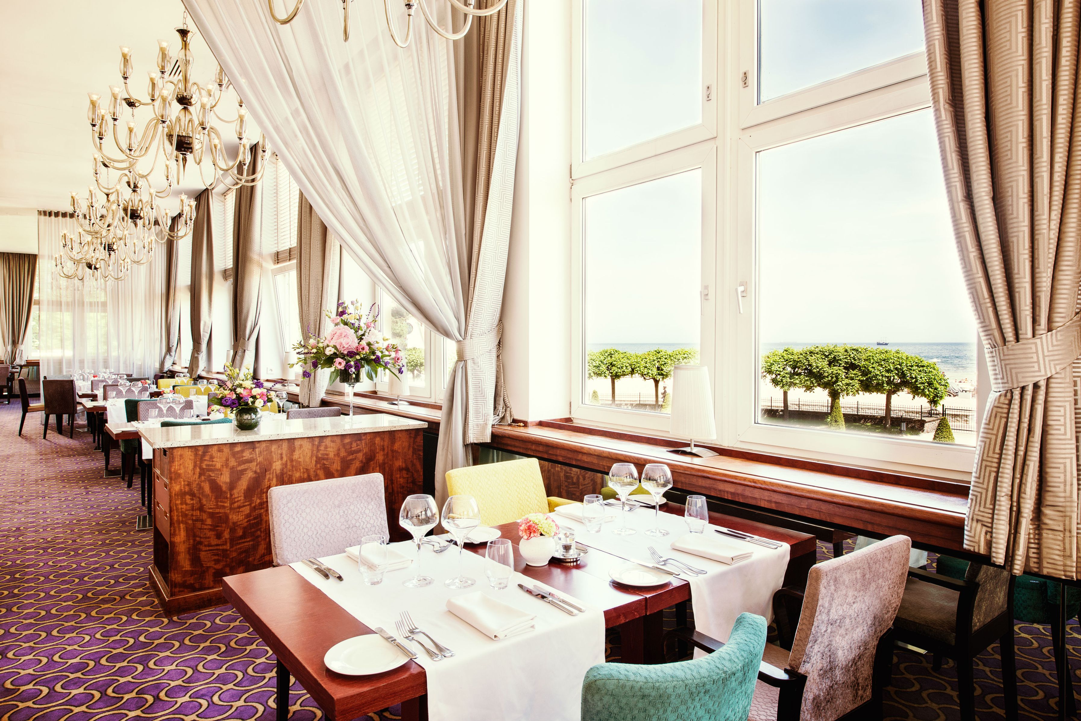 a restaurant with tables and chairs