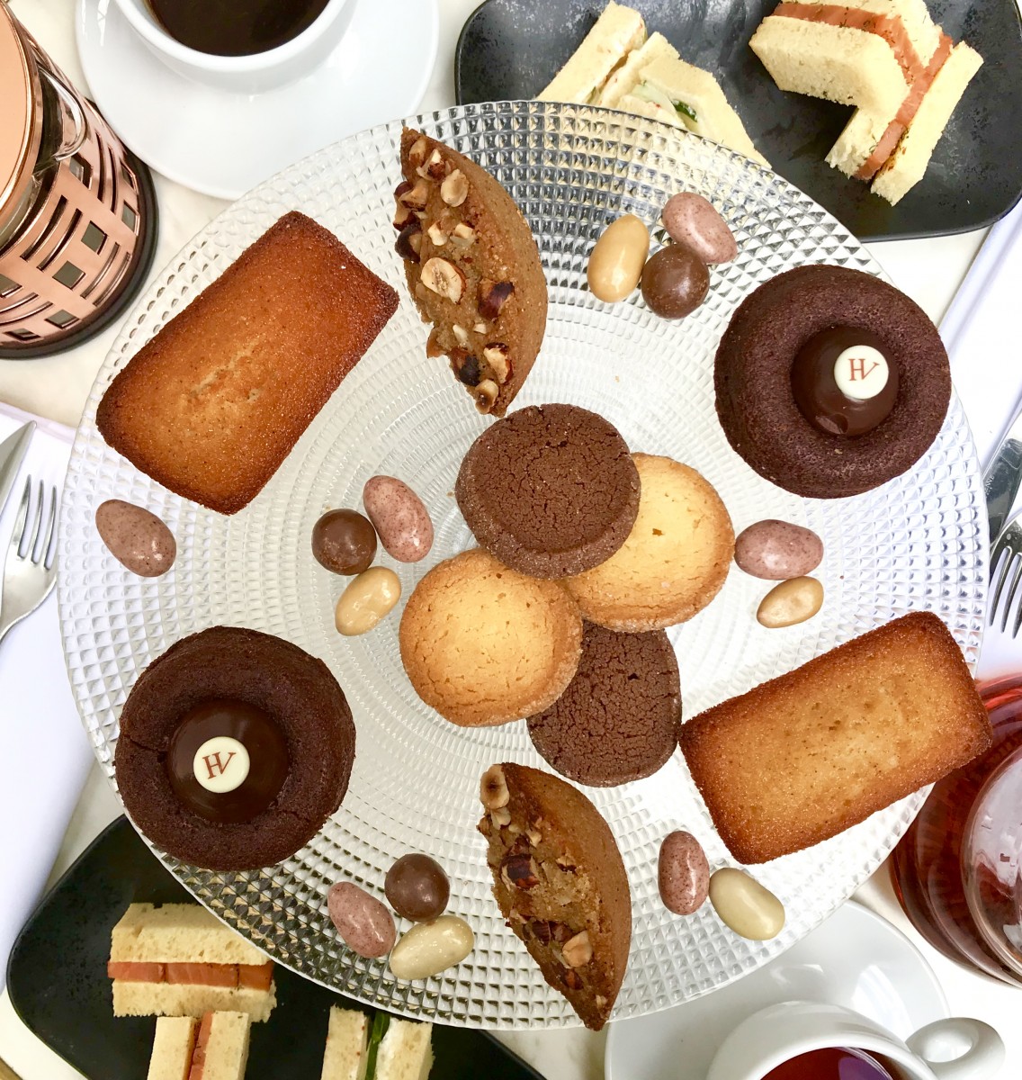 a plate of cookies and cookies on a table