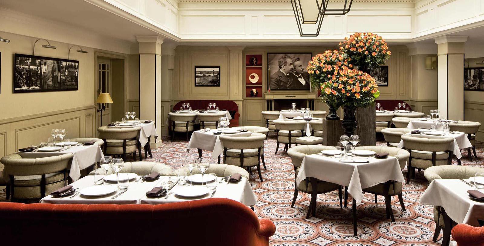 a restaurant with tables and chairs
