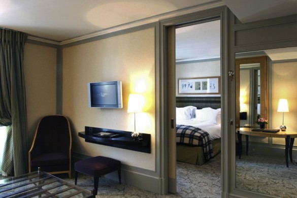a room with a television and a mirror