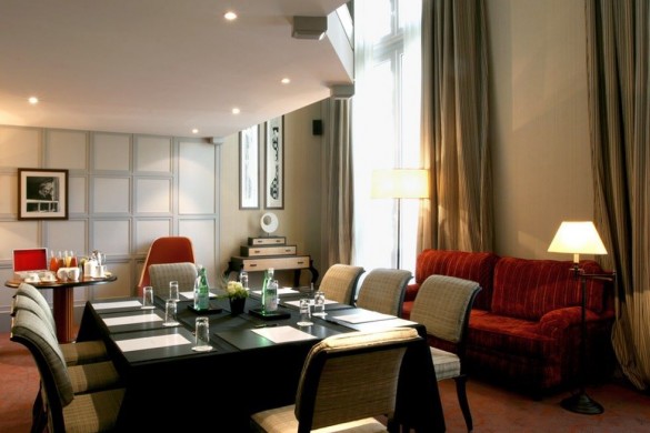 a room with a table and chairs