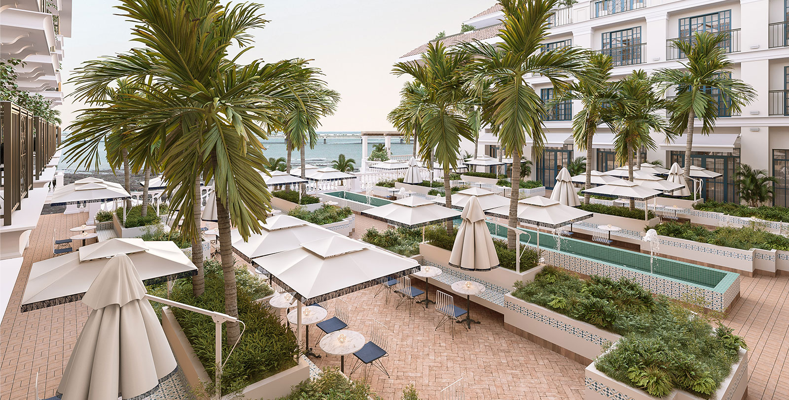 a patio area with palm trees and umbrellas