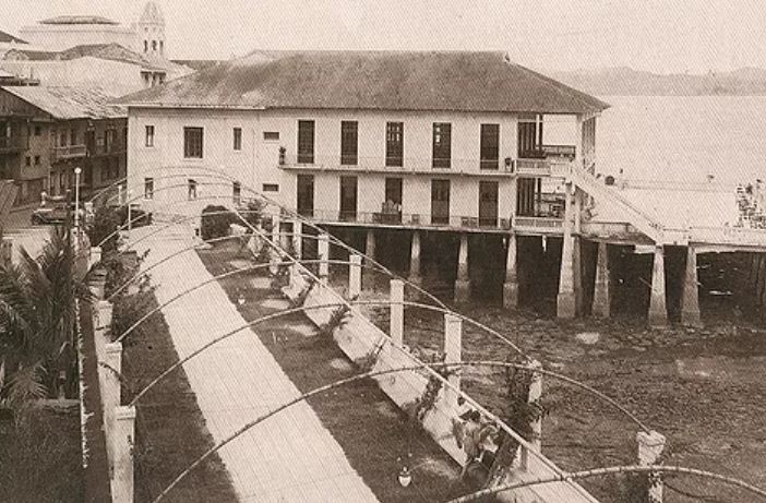 a building with a bridge and a walkway