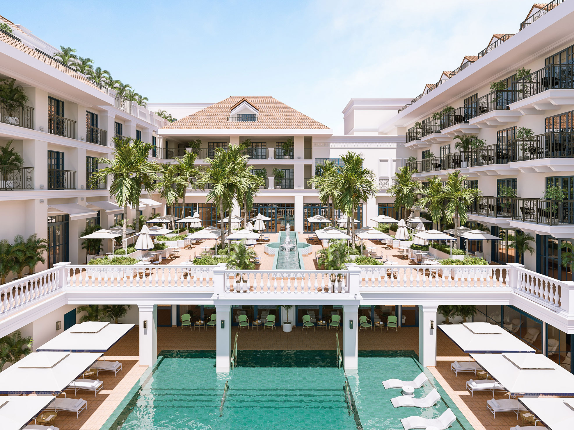 Luxurious resort courtyard featuring a swimming pool with lounge chairs on the lower level, a central fountain terrace with palm trees on the upper courtyard, and colonial-style balconies.
