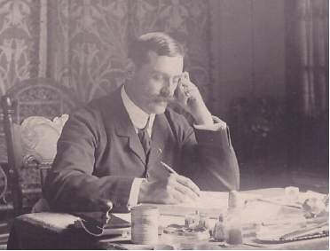 a man sitting at a desk