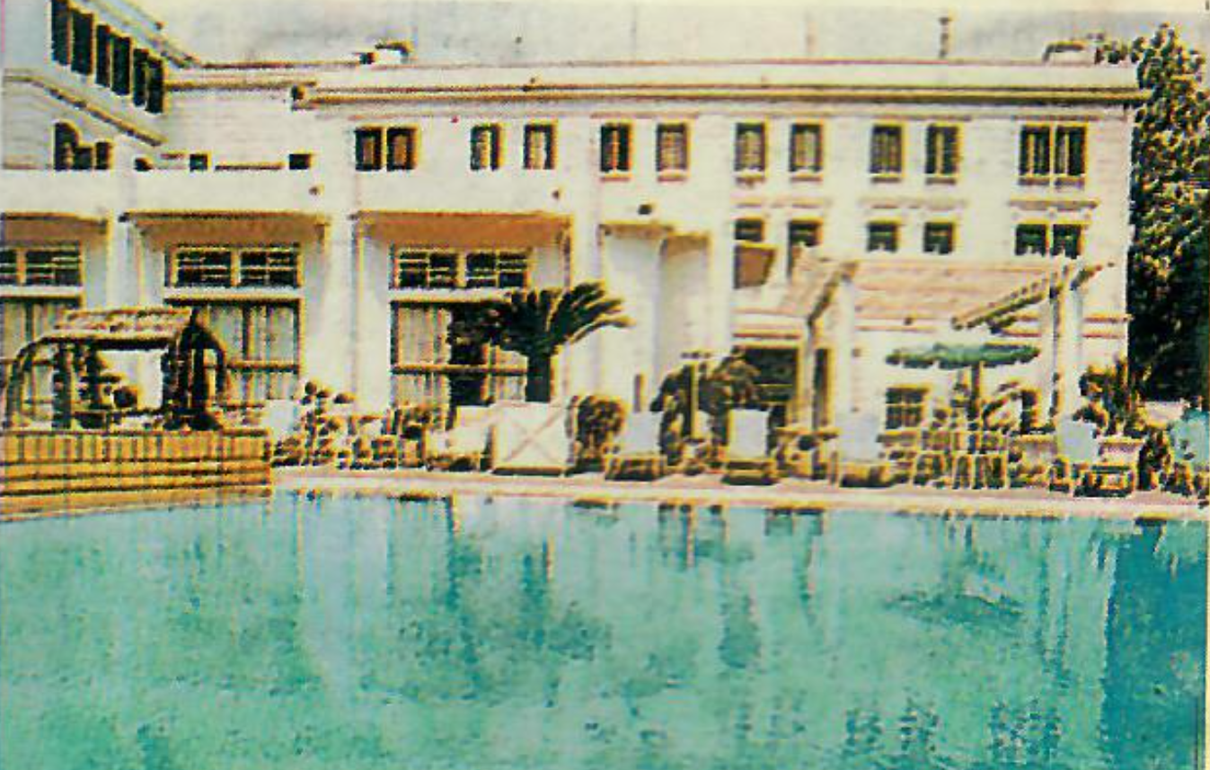 a pool in front of a building