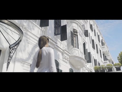 a woman walking down a street