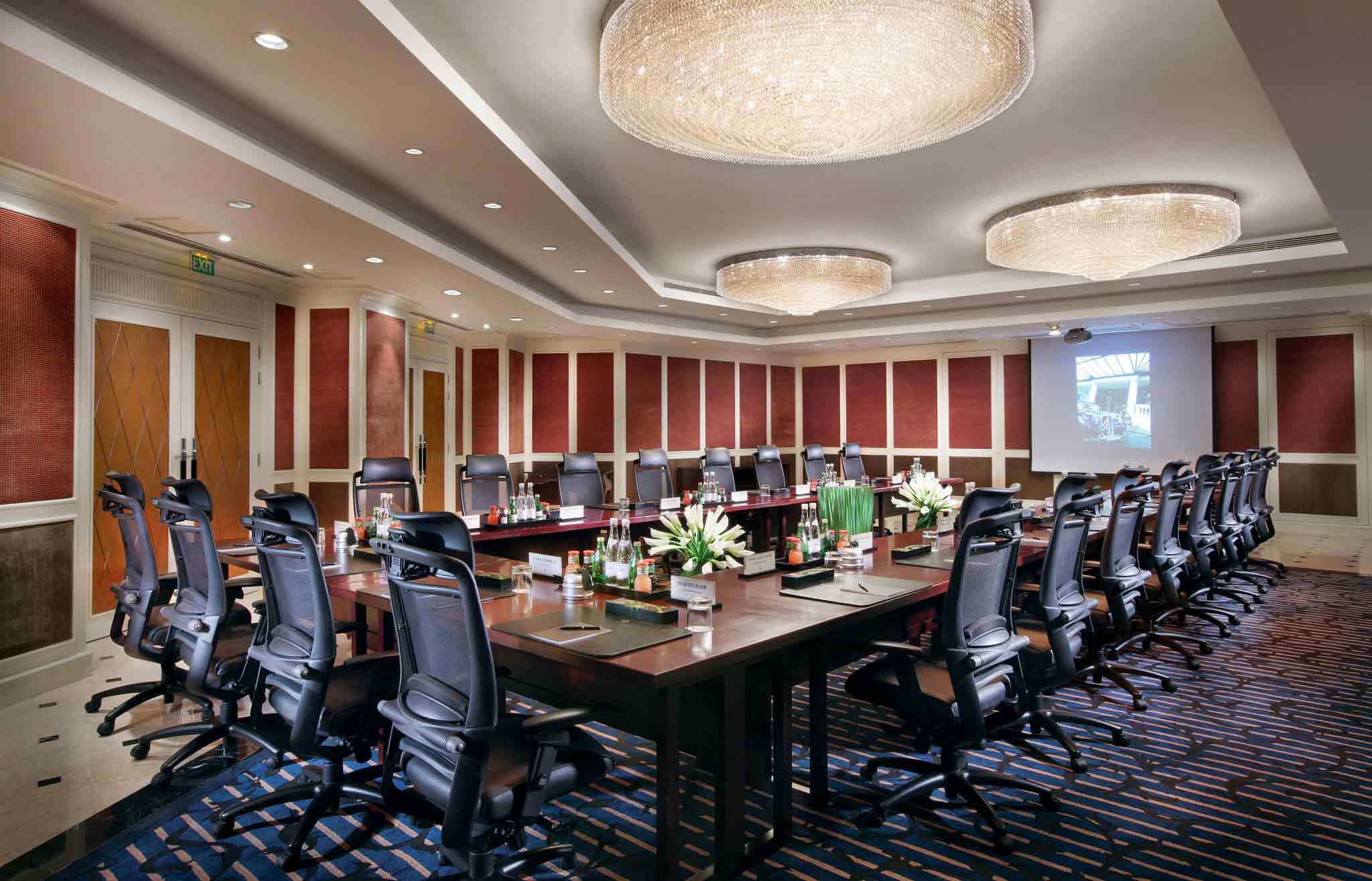 a conference room with chairs and a table