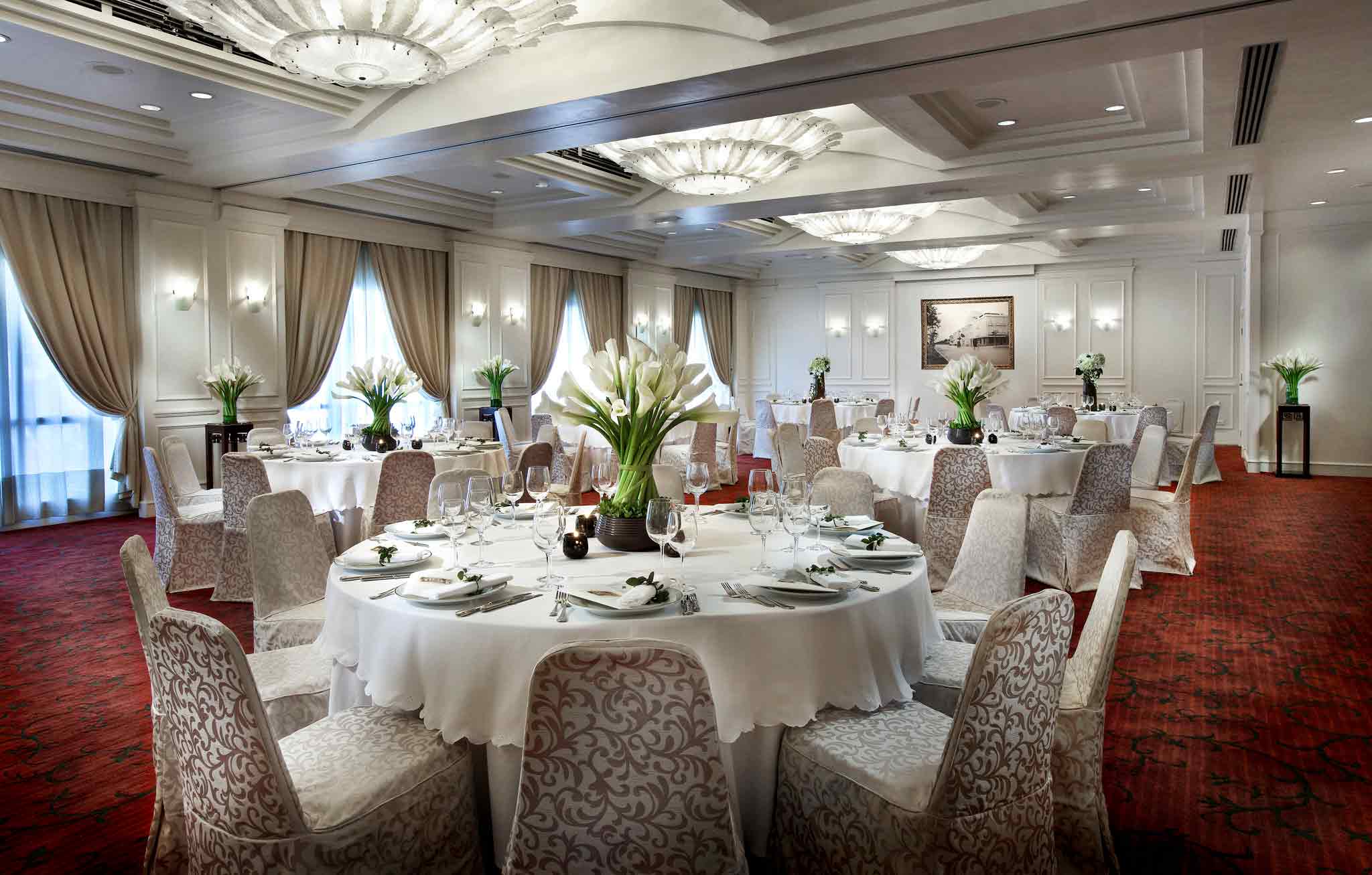 a room with tables and chairs