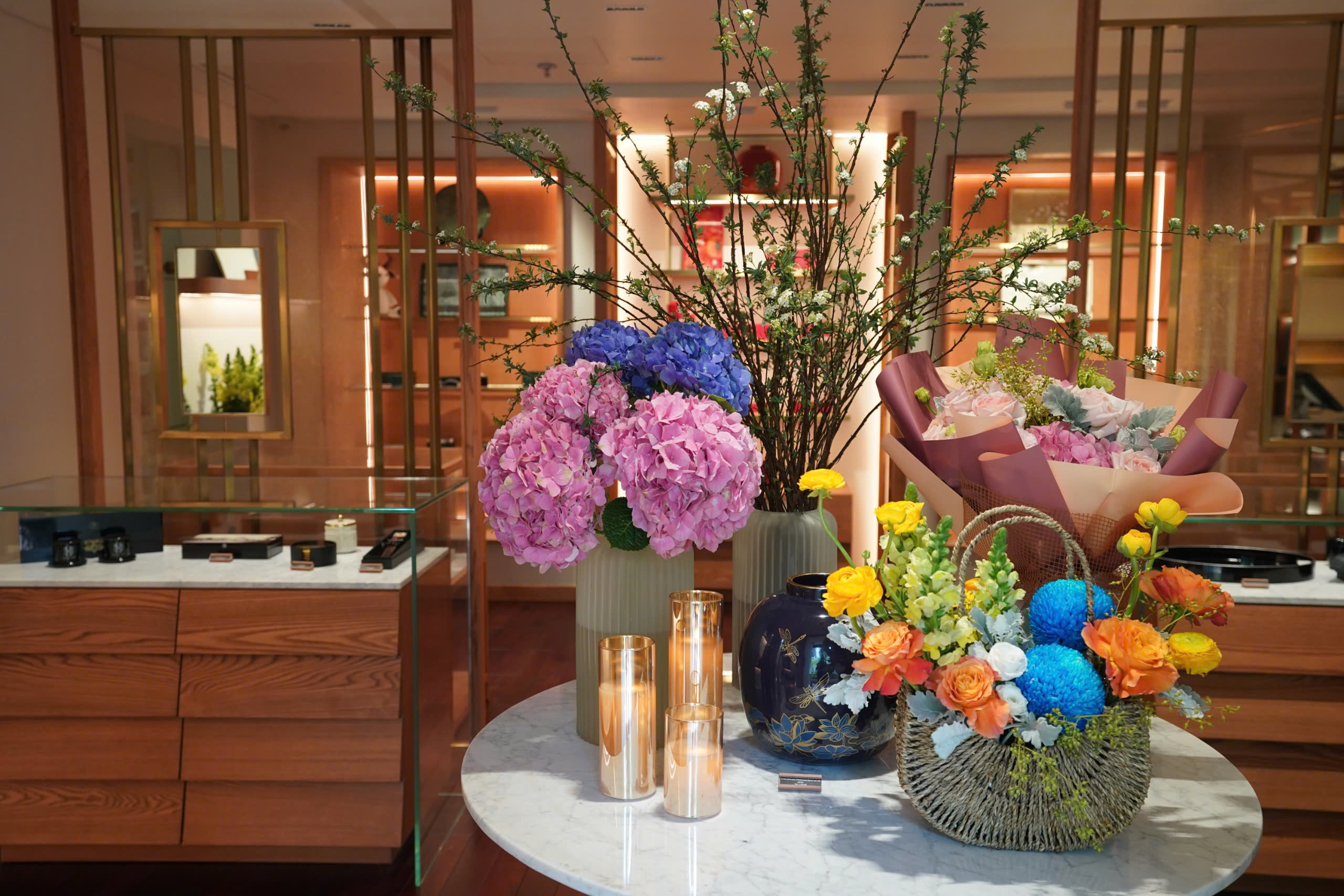 a table with flowers and candles