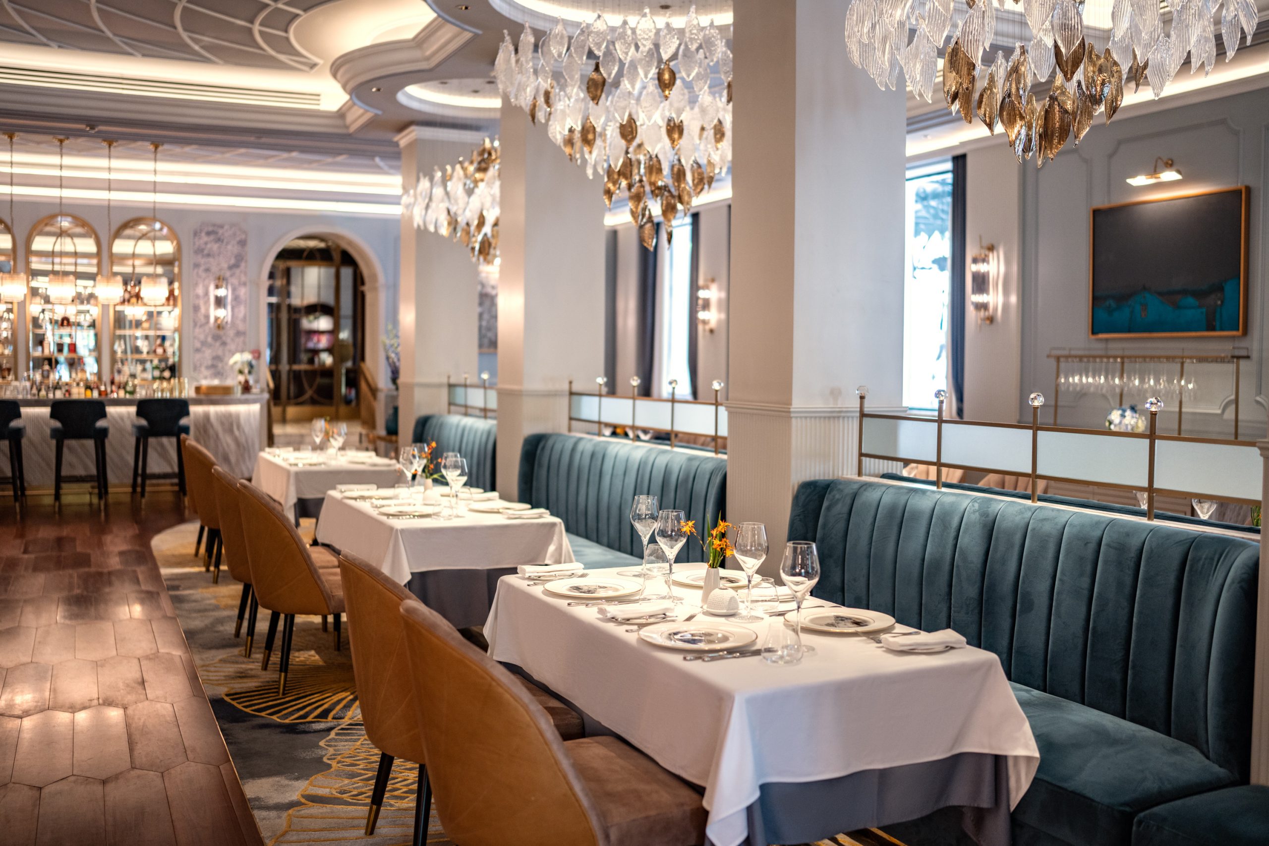 a restaurant with tables and chairs