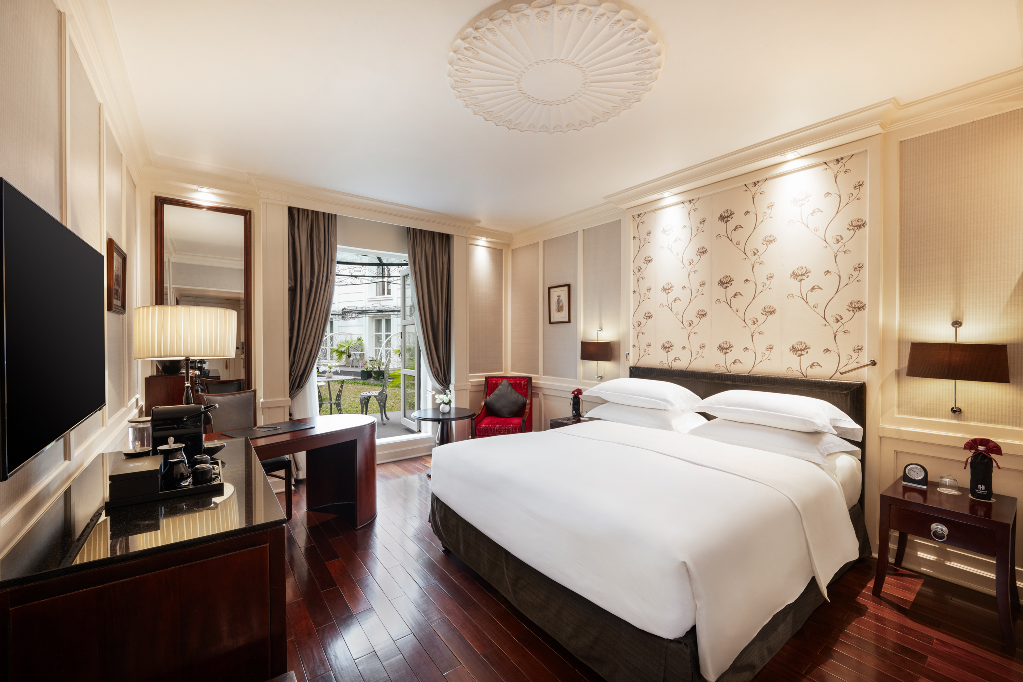 a room with a bed and a desk