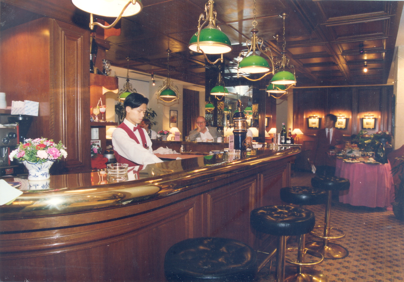 a man behind a bar