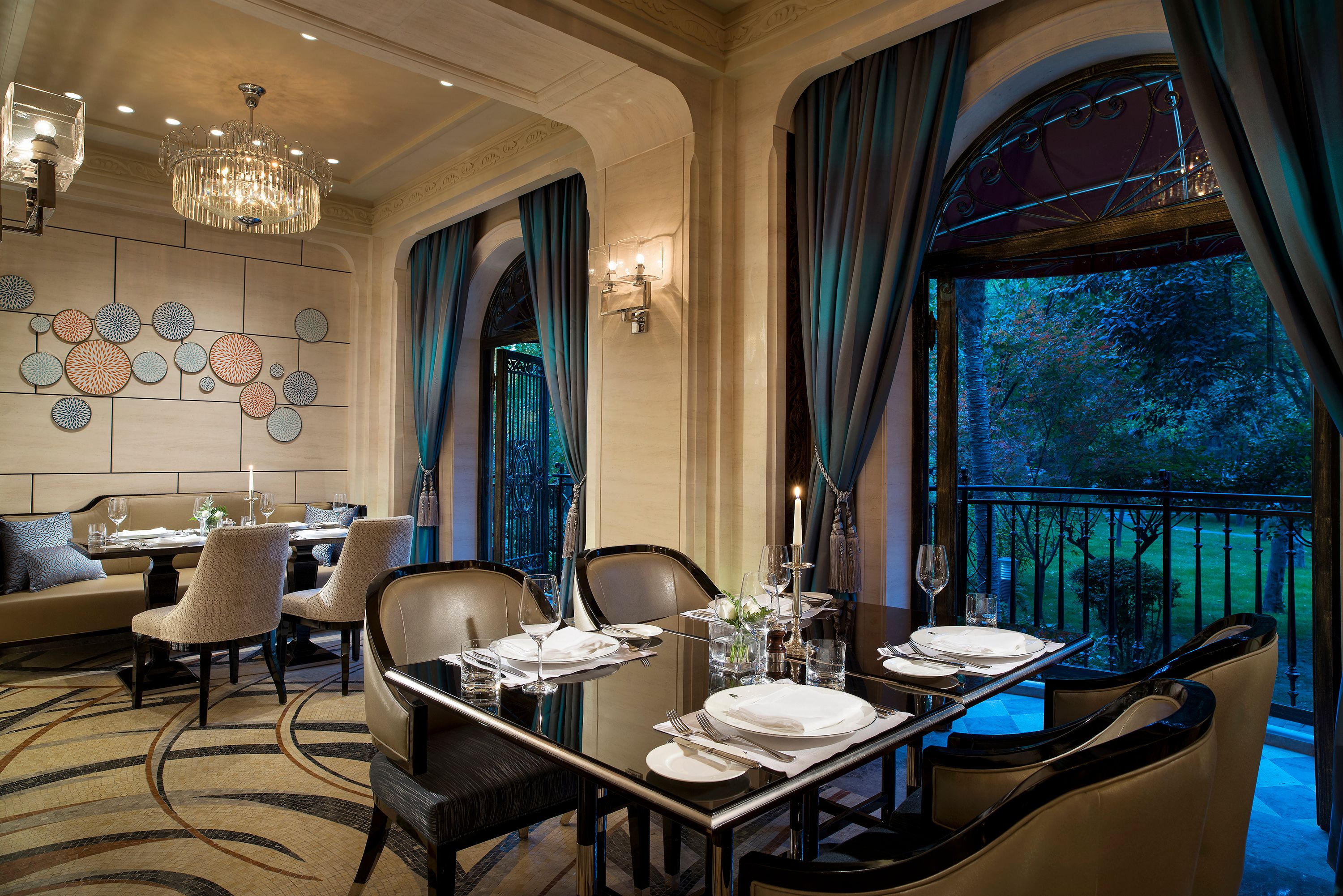 a dining room with a table and chairs