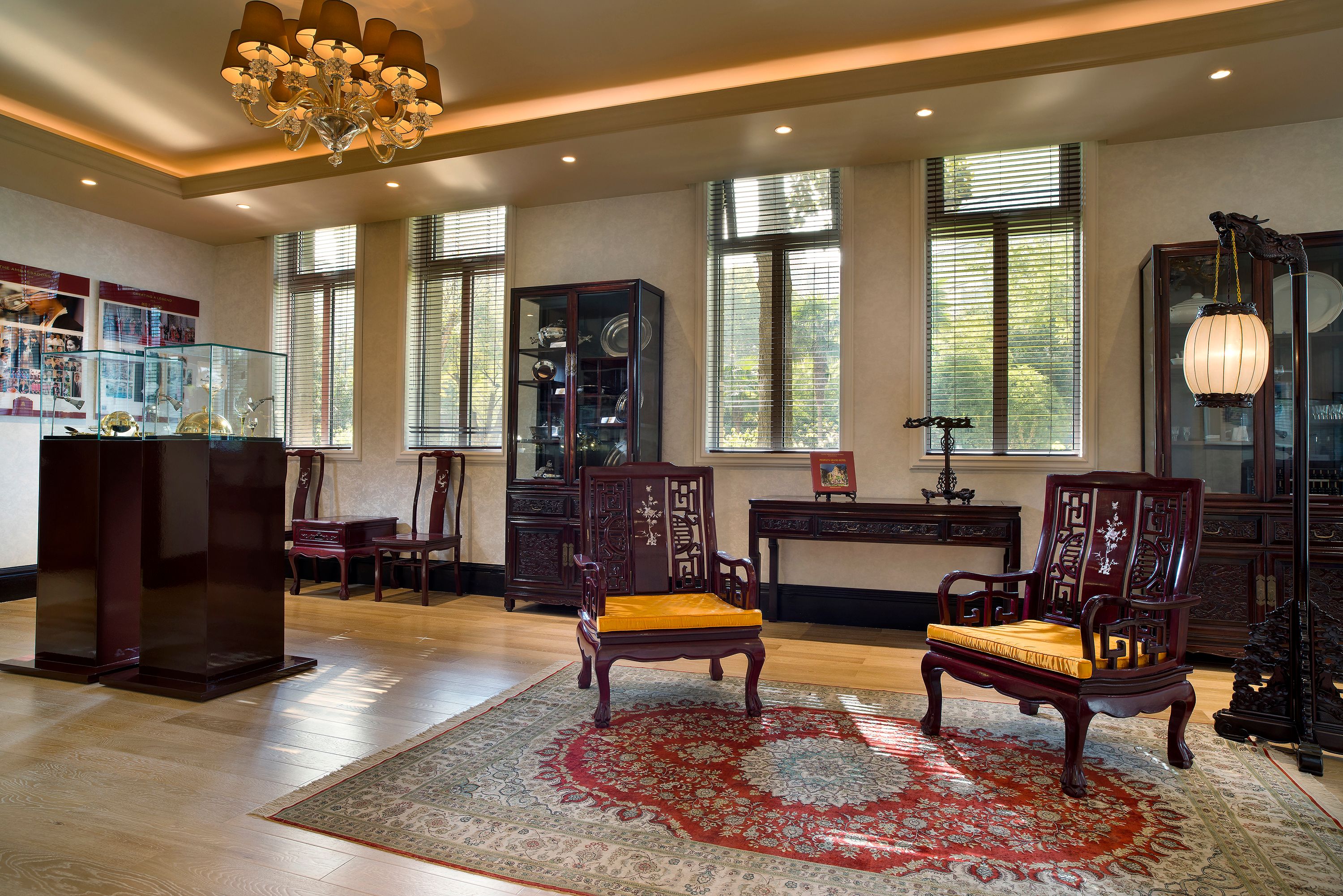 a room with a chandelier and chairs