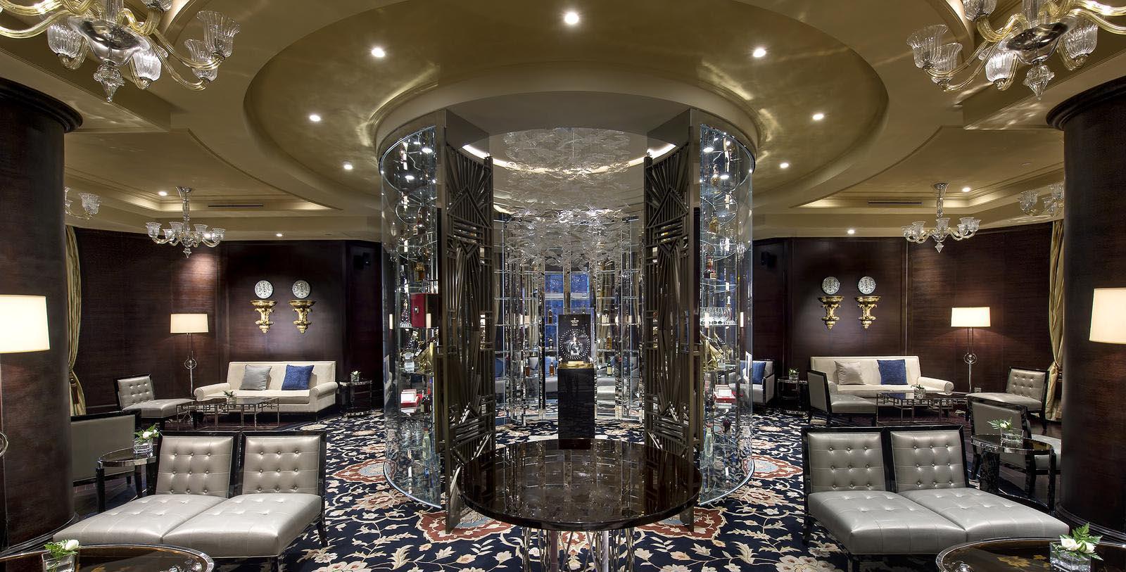 a room with a round table and chairs