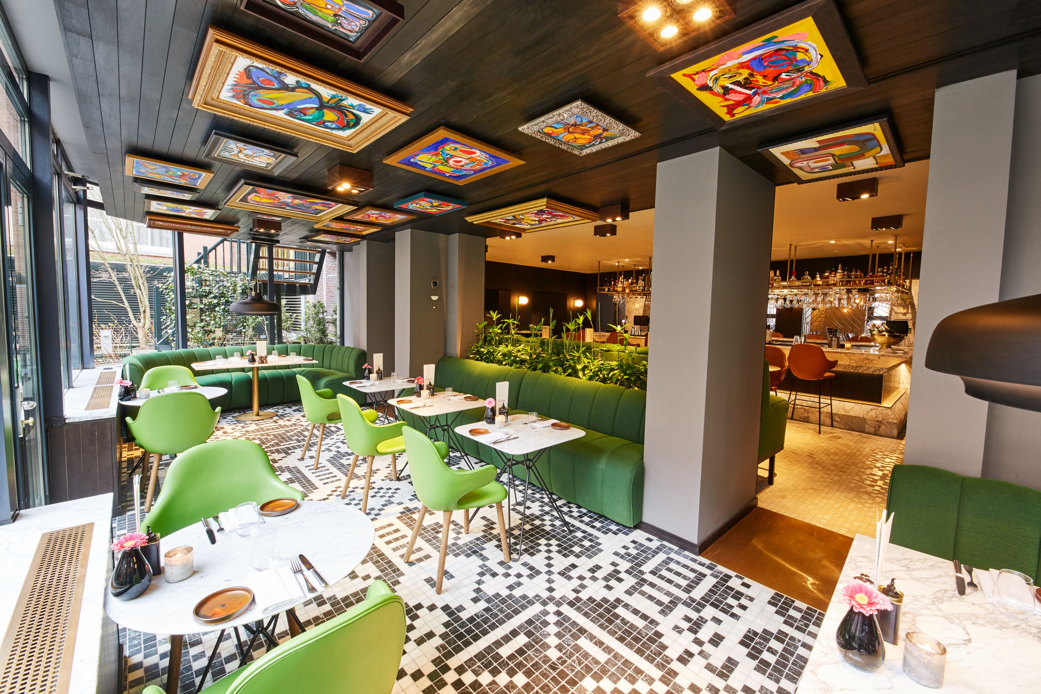 a restaurant with tables and chairs