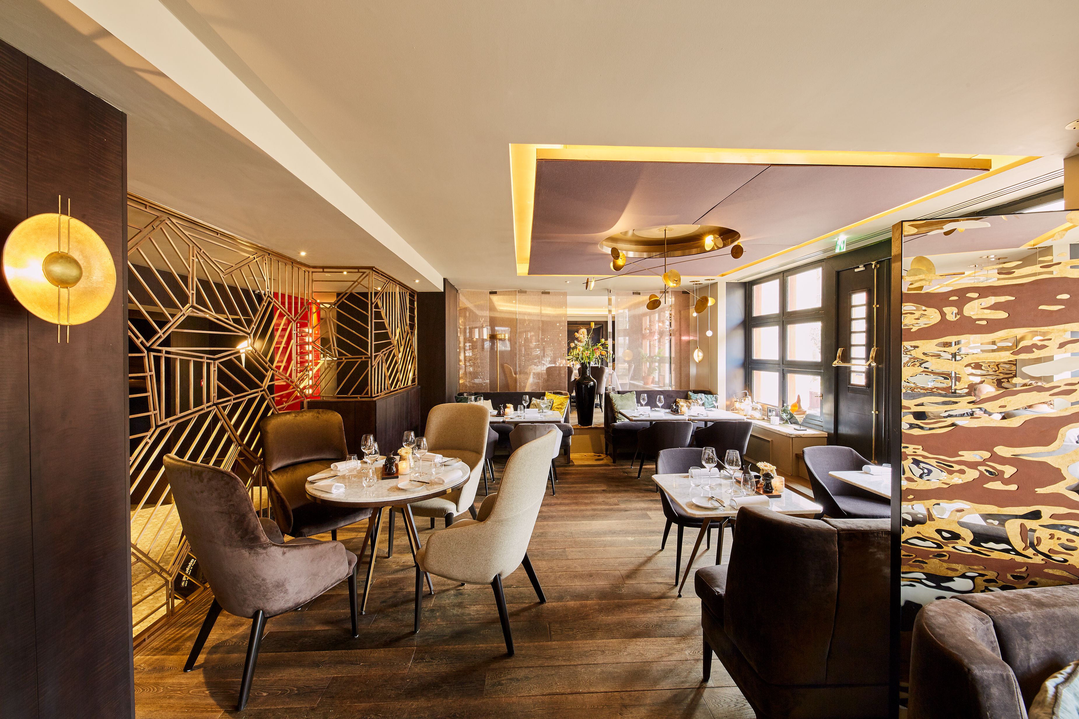 a restaurant with tables and chairs