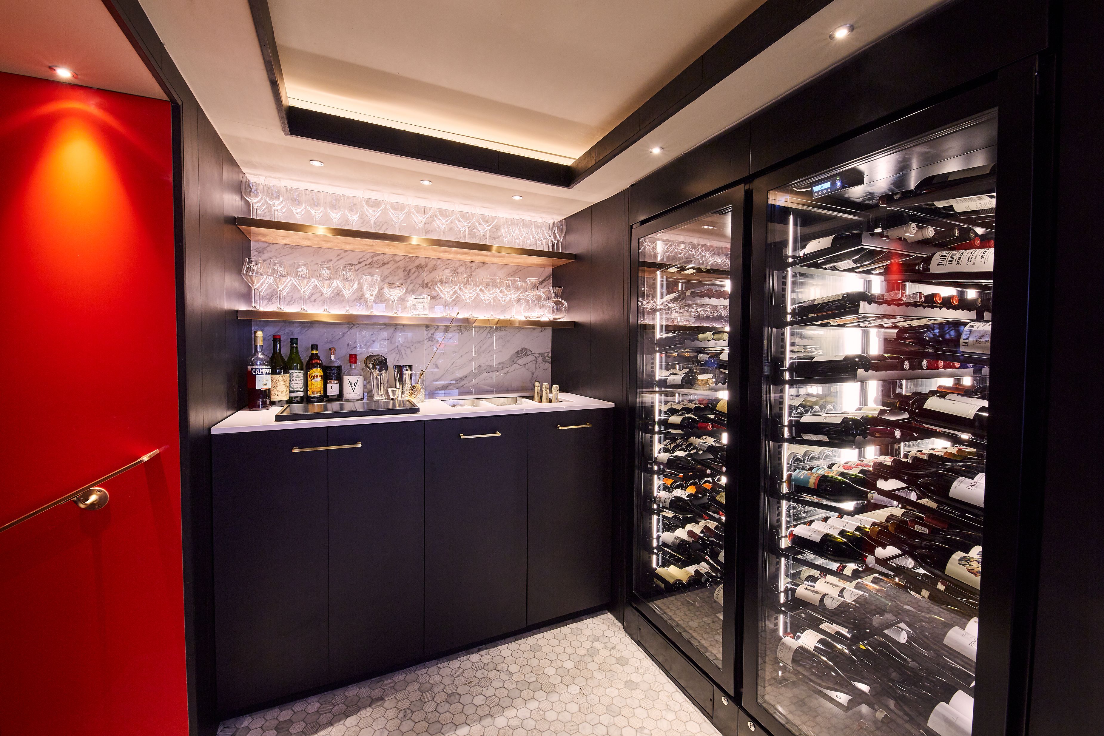 a wine cellar with bottles of wine