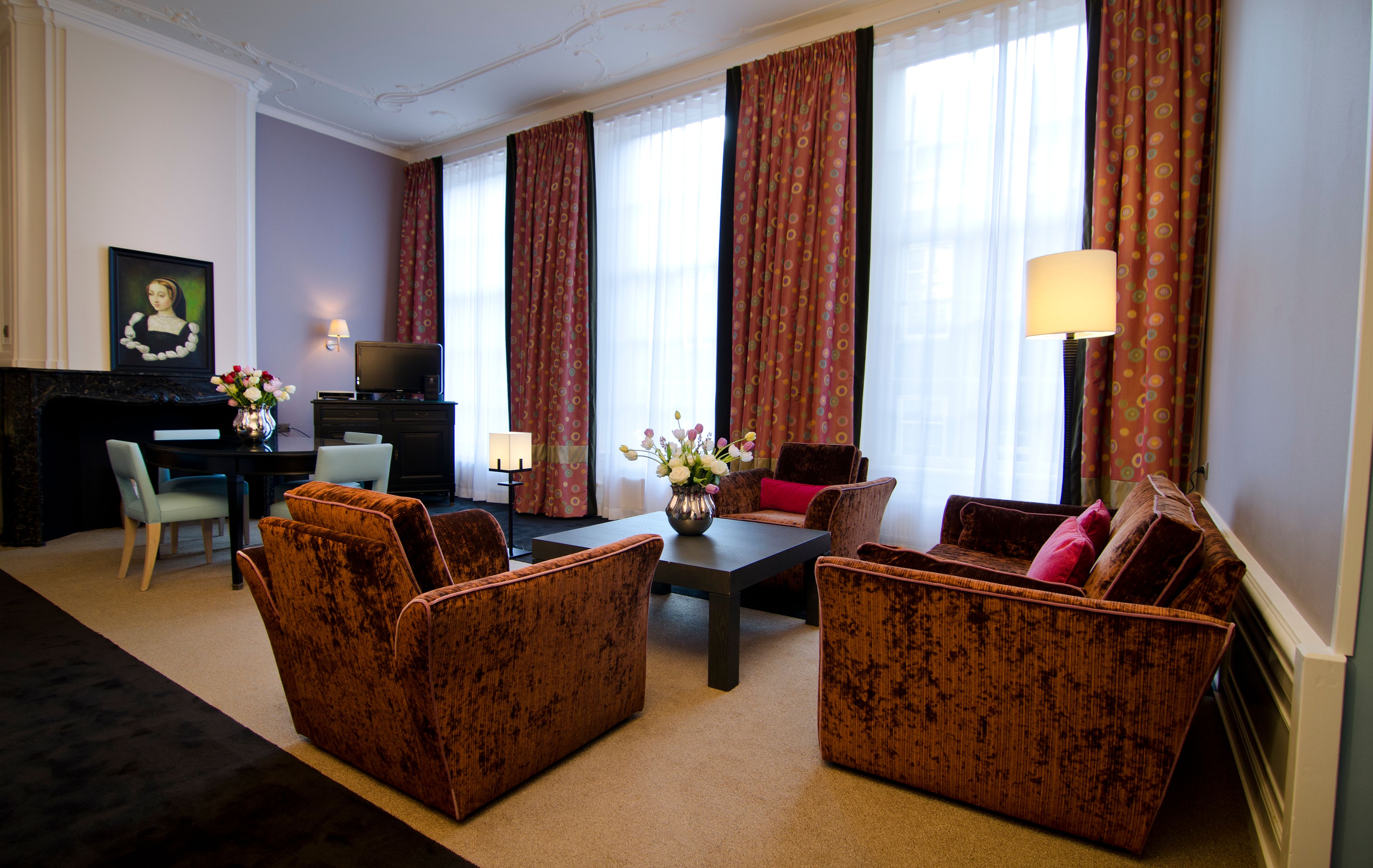 a room with couches and a table