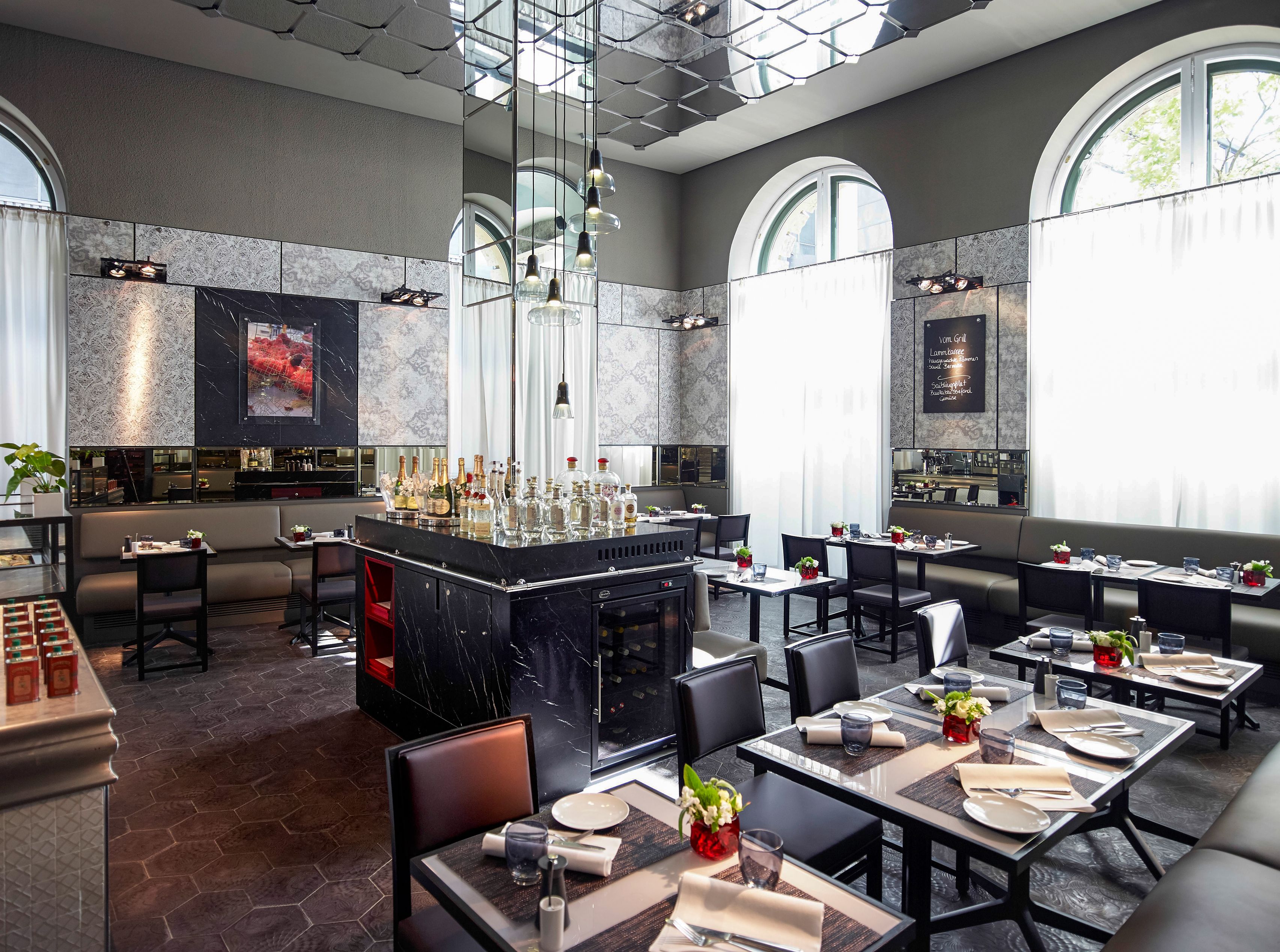 a restaurant with tables and chairs